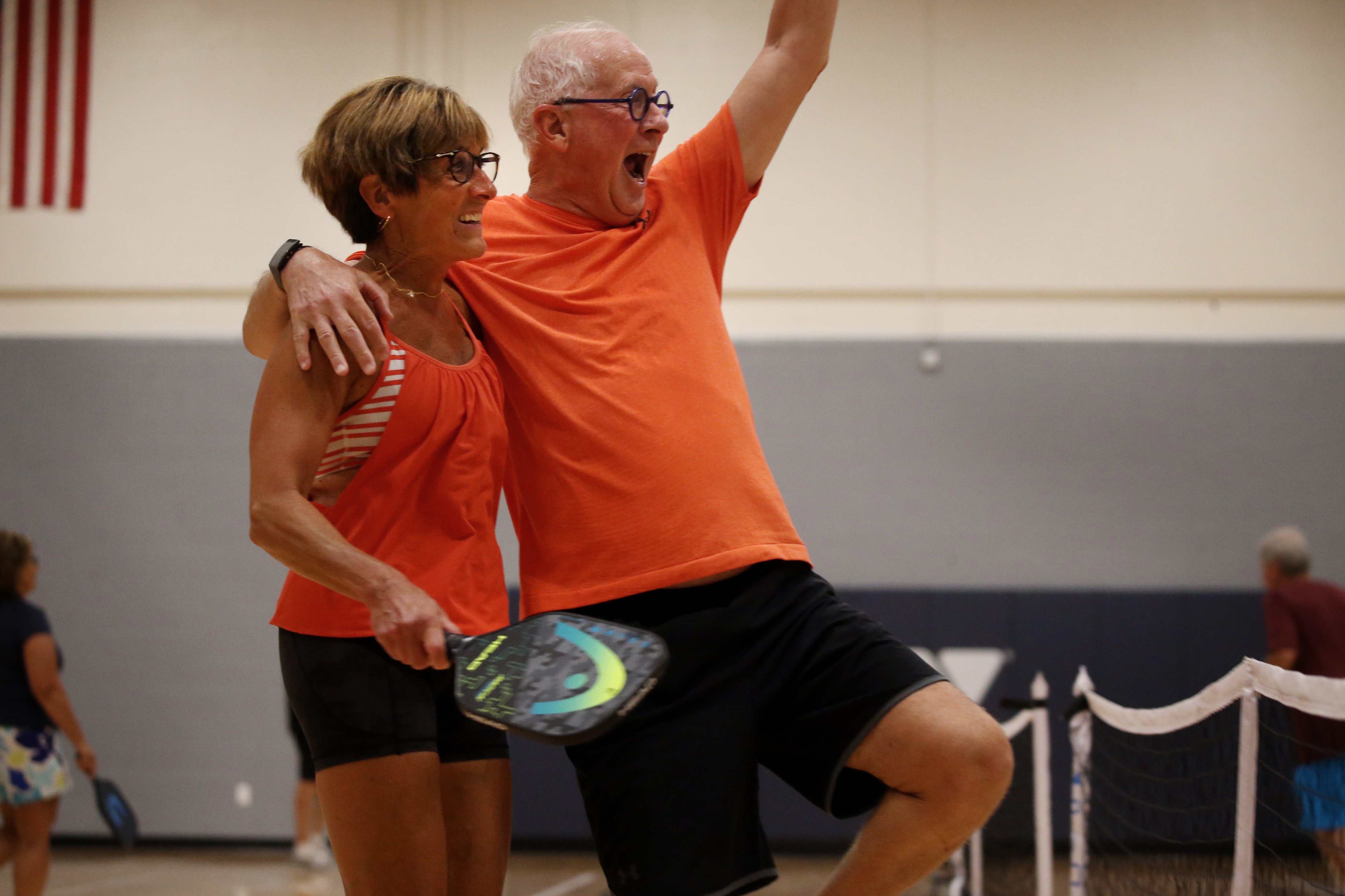 Ellen Alessi and Bob Cohen celebrated their victory while playing pickleball at the Cape Ann YMCA in Gloucester.