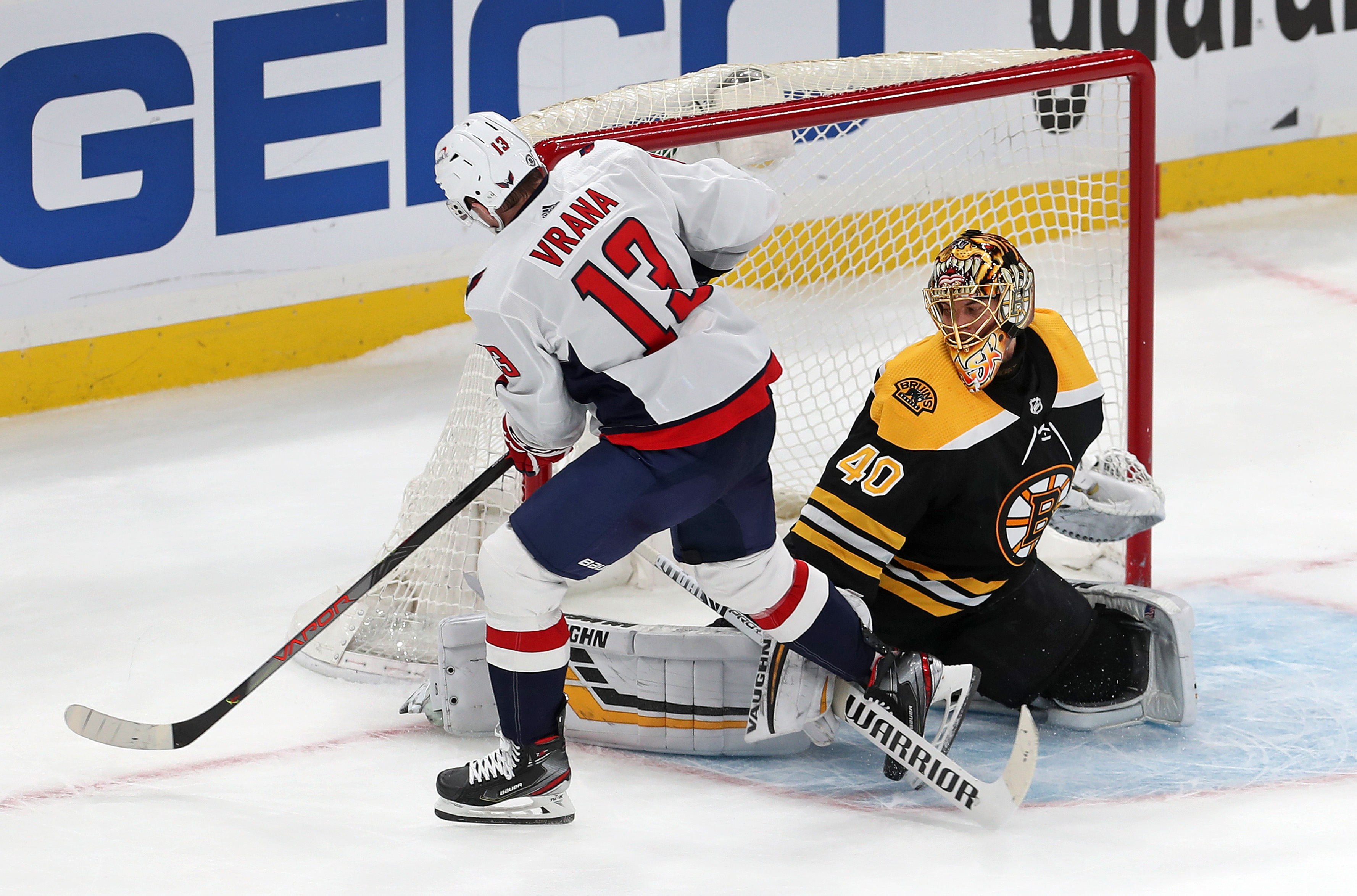 Jakub Vrana slips the puck past Tuukka Rask in the shootout to lift the Capitals.