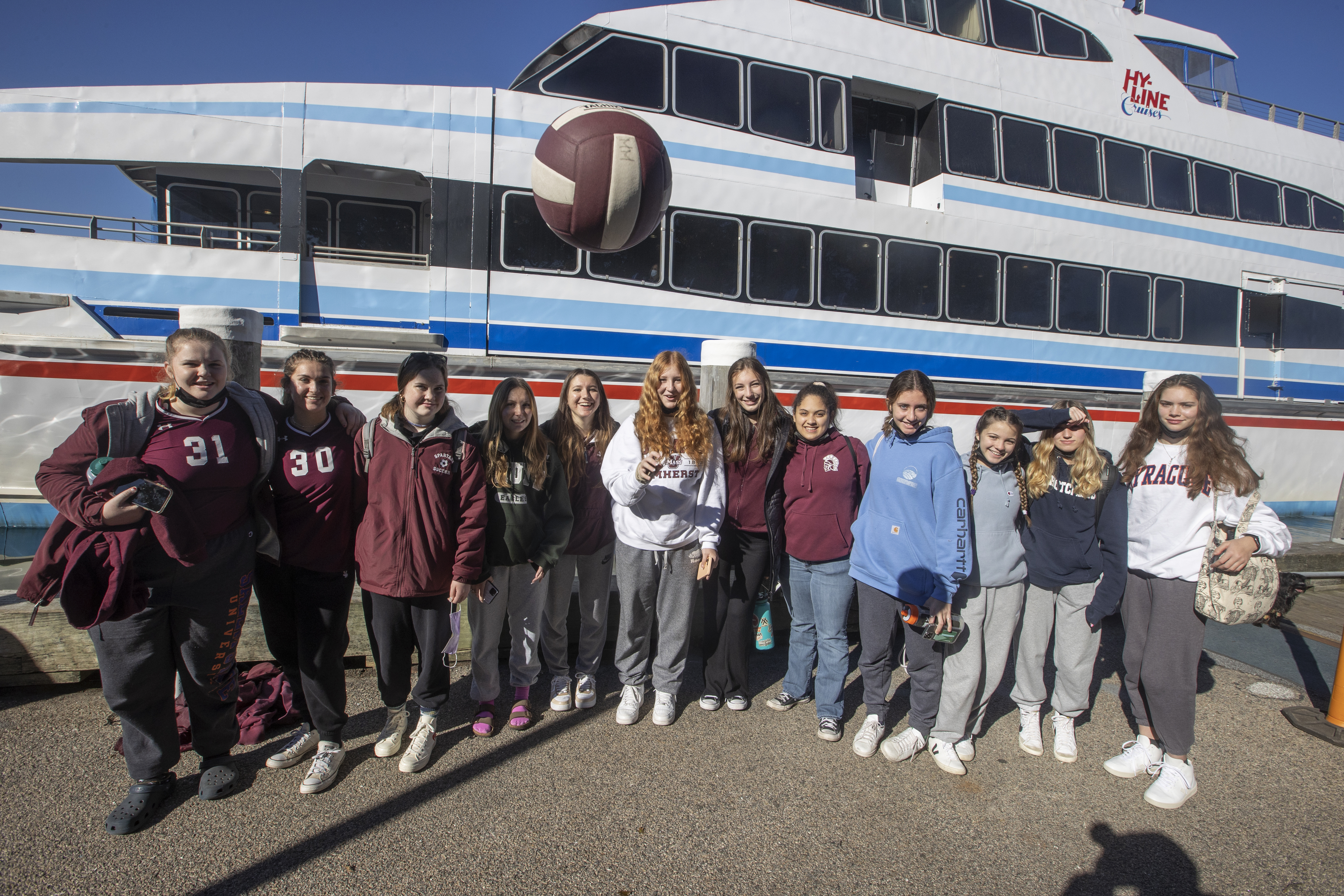 The visitors from the other side of the state pose in front of the ferry.