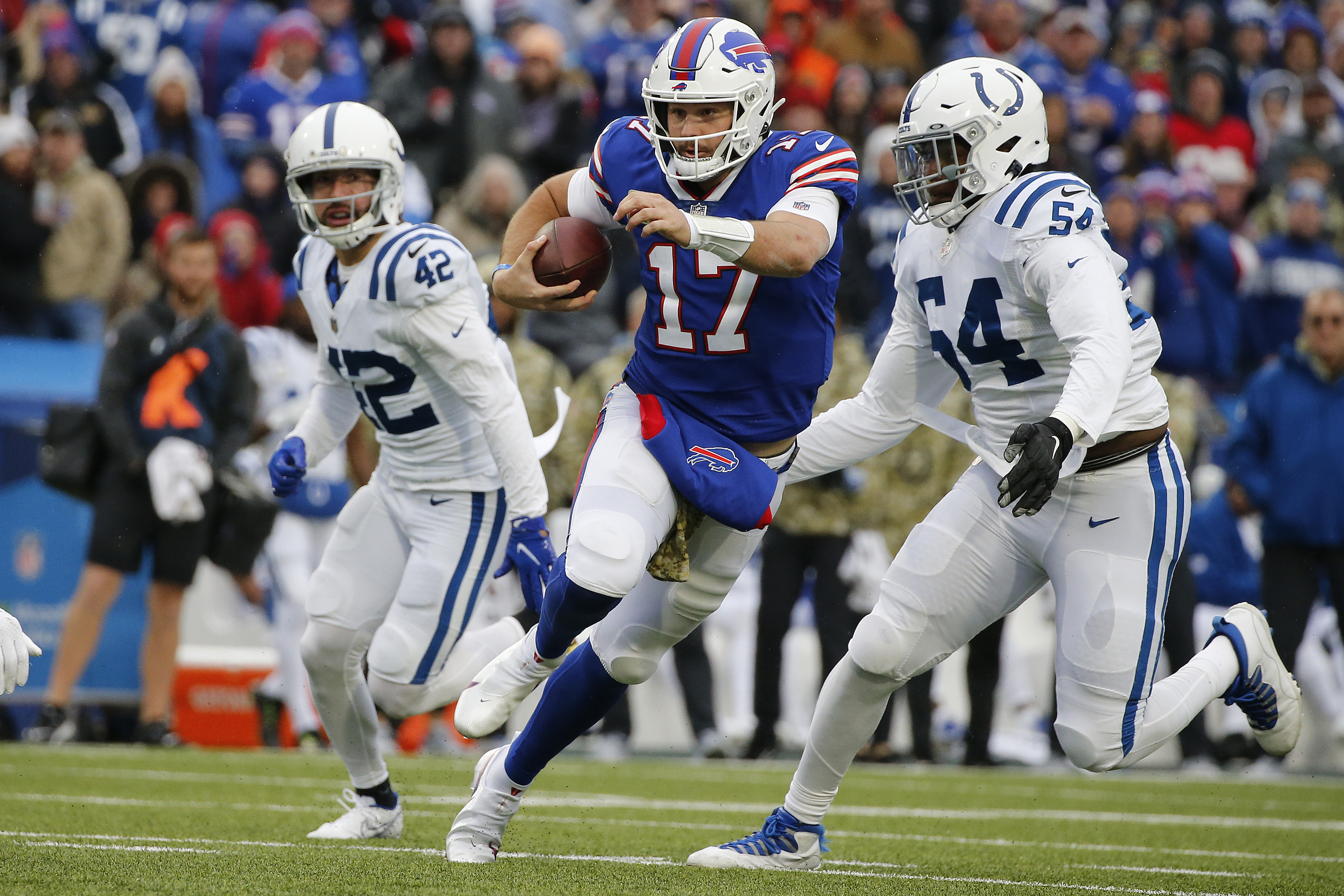 Taylor runs up the score with 5 TDs; Colts beat Bills 41-15