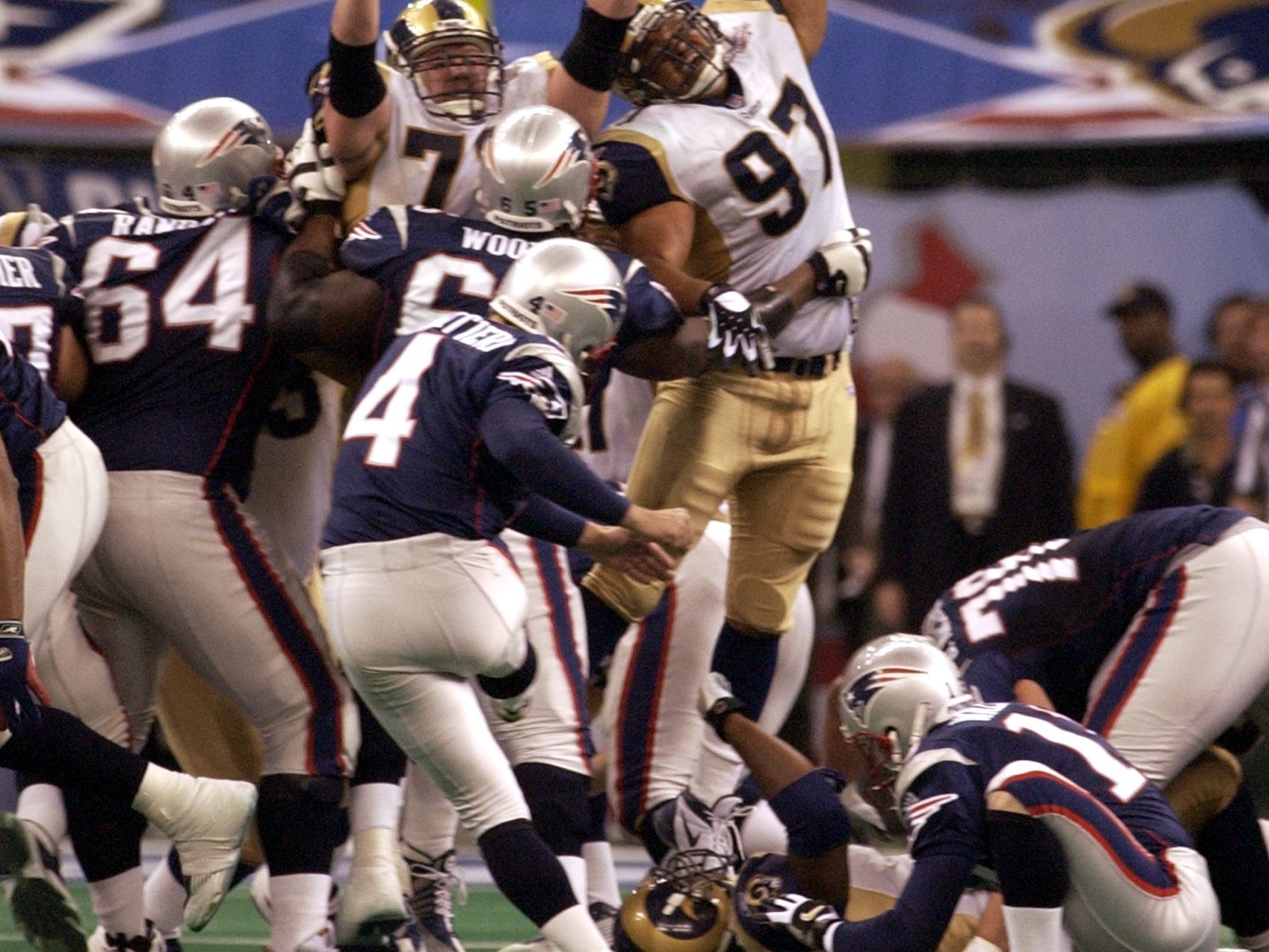 Adam Vinatieri's last-second 48-yard field goal beats the Rams and delivers the first NFL championship in franchise history.