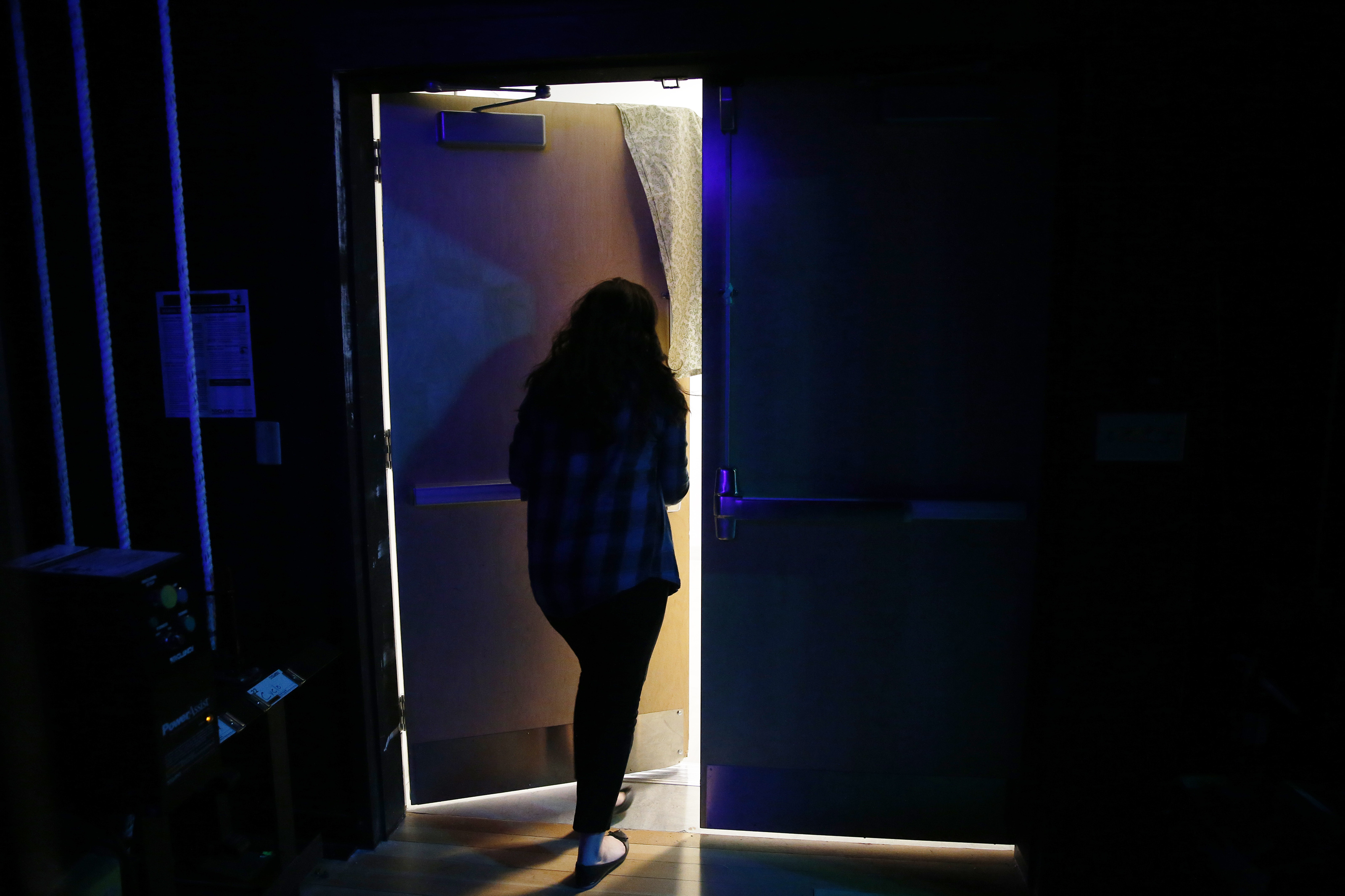 Deb pushed her way through a door off stage during a rehearsal at Danvers High School, where their first performance of the festival would be held.