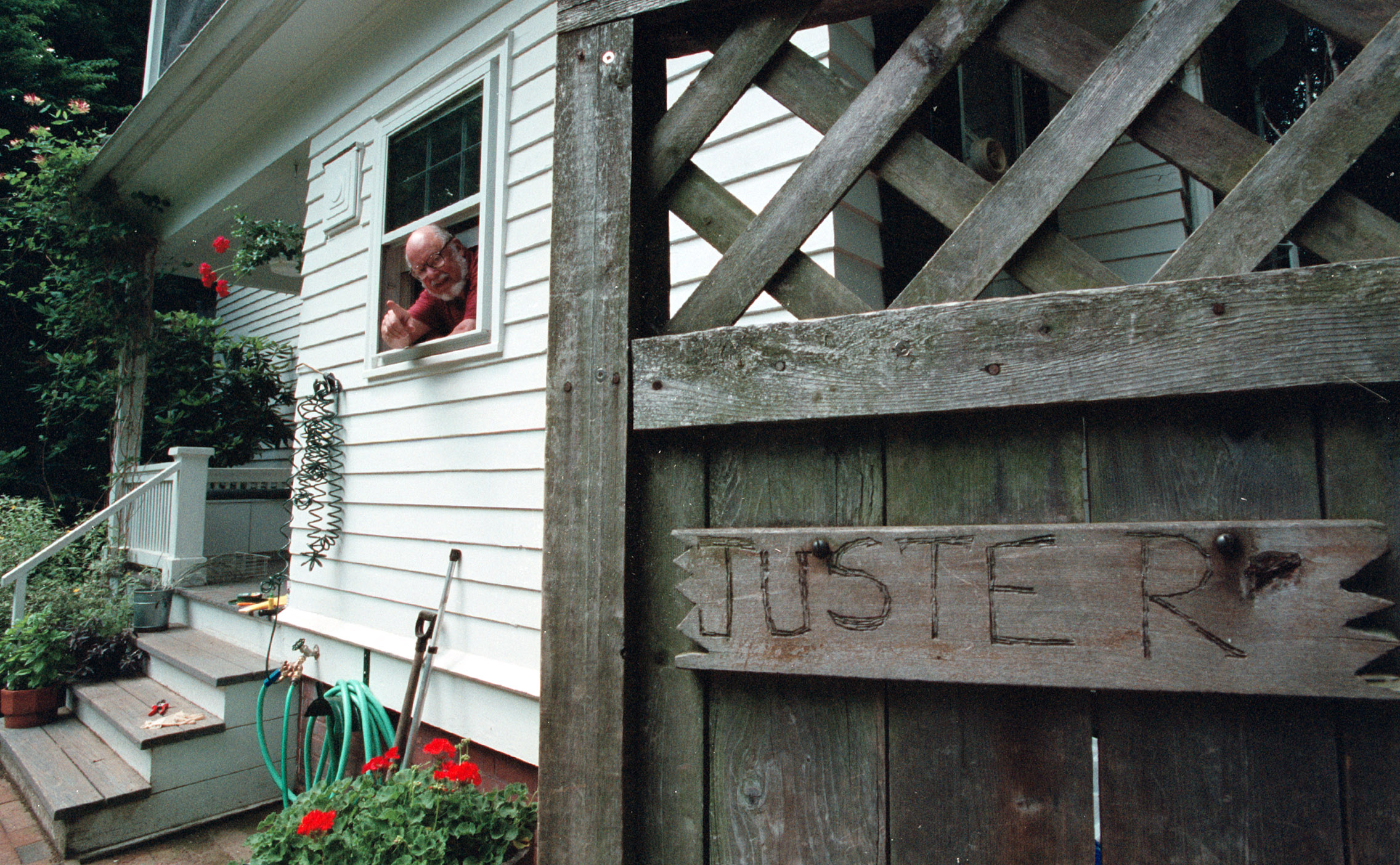 Norton Juster waved from his 'hello, goodbye window,' which is the title of his 2001 book.