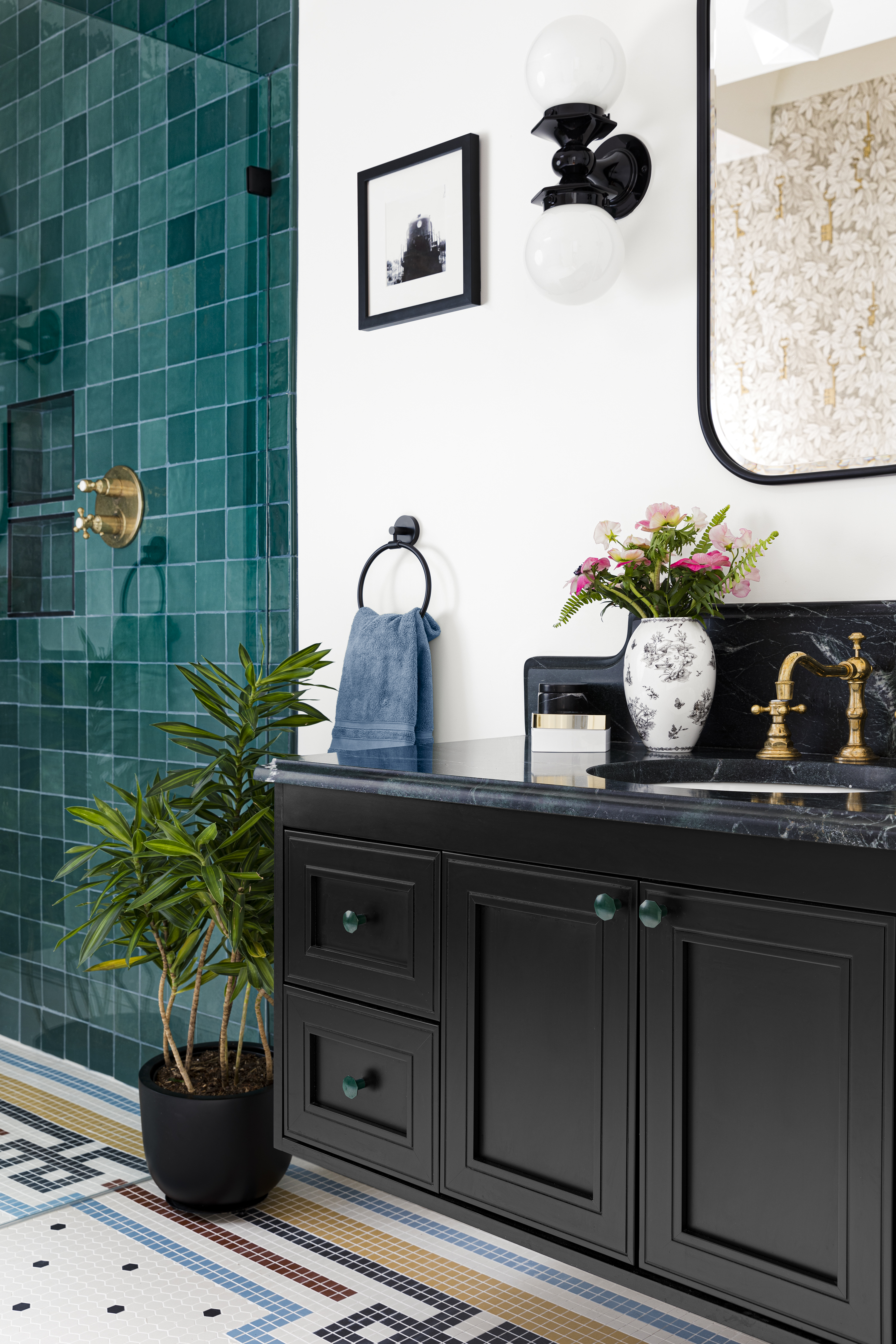 Designer Cecilia Casagrande commissioned a tile company to re-create a section of floor from an old photo of Seattle’s Union Station for this bathroom redesign.