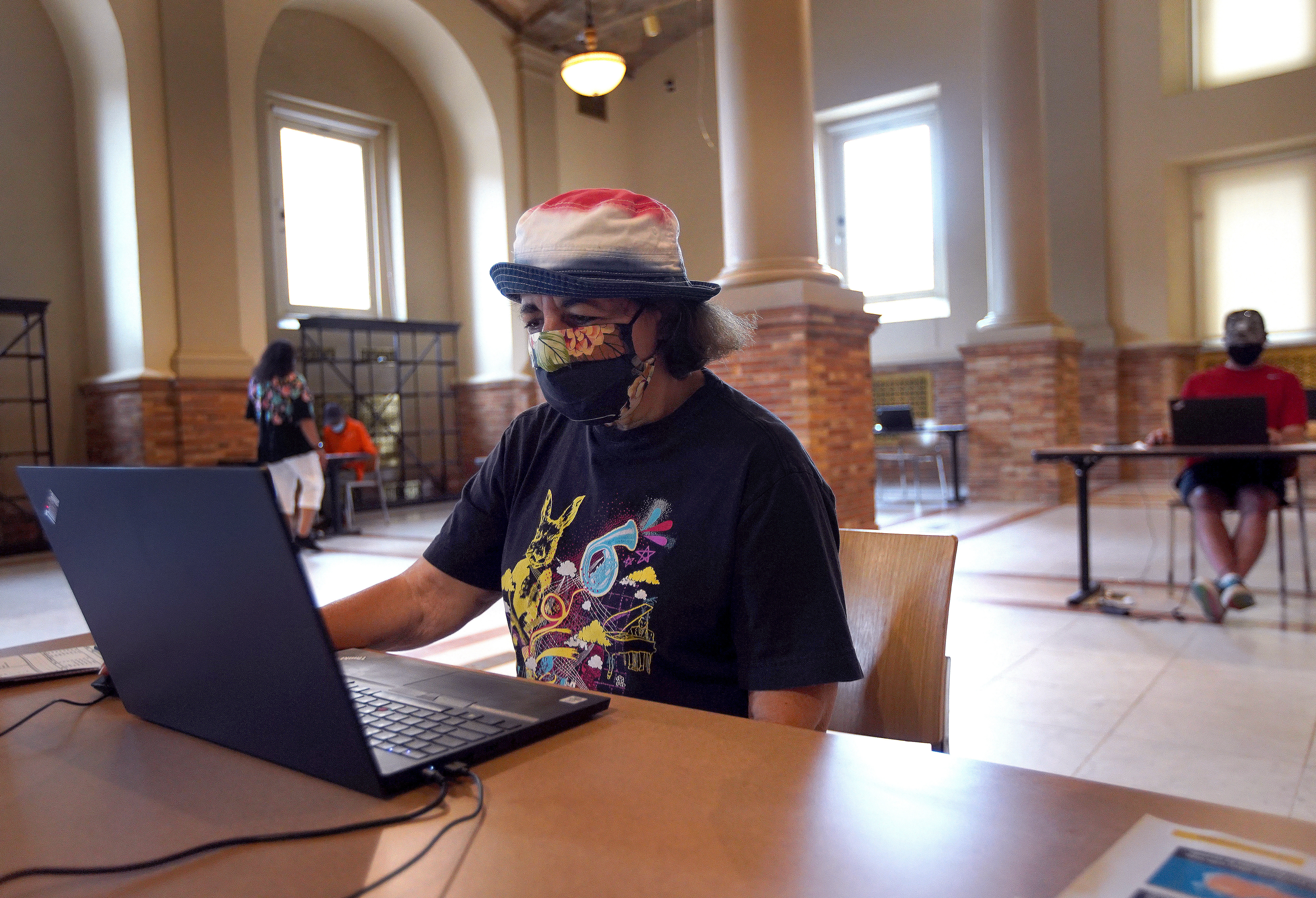 Nancy Veznaian used a computer work station inside the Boston Public Library's Central Library Copley Square branch.