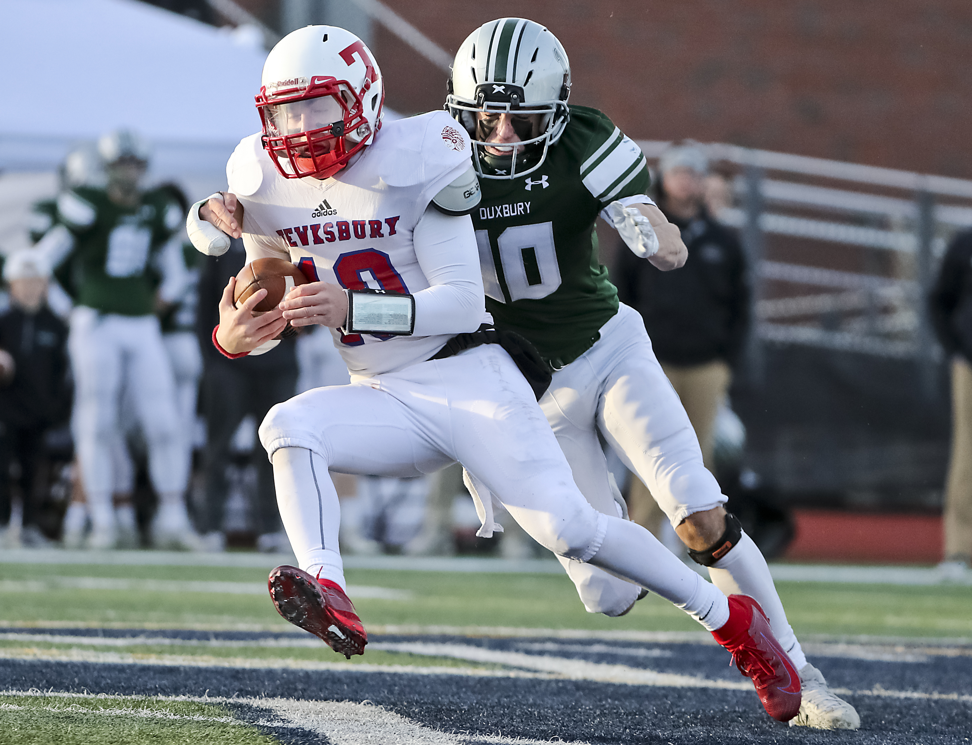 Ryne Rametta (left) is Tewksbury's quarterback.
