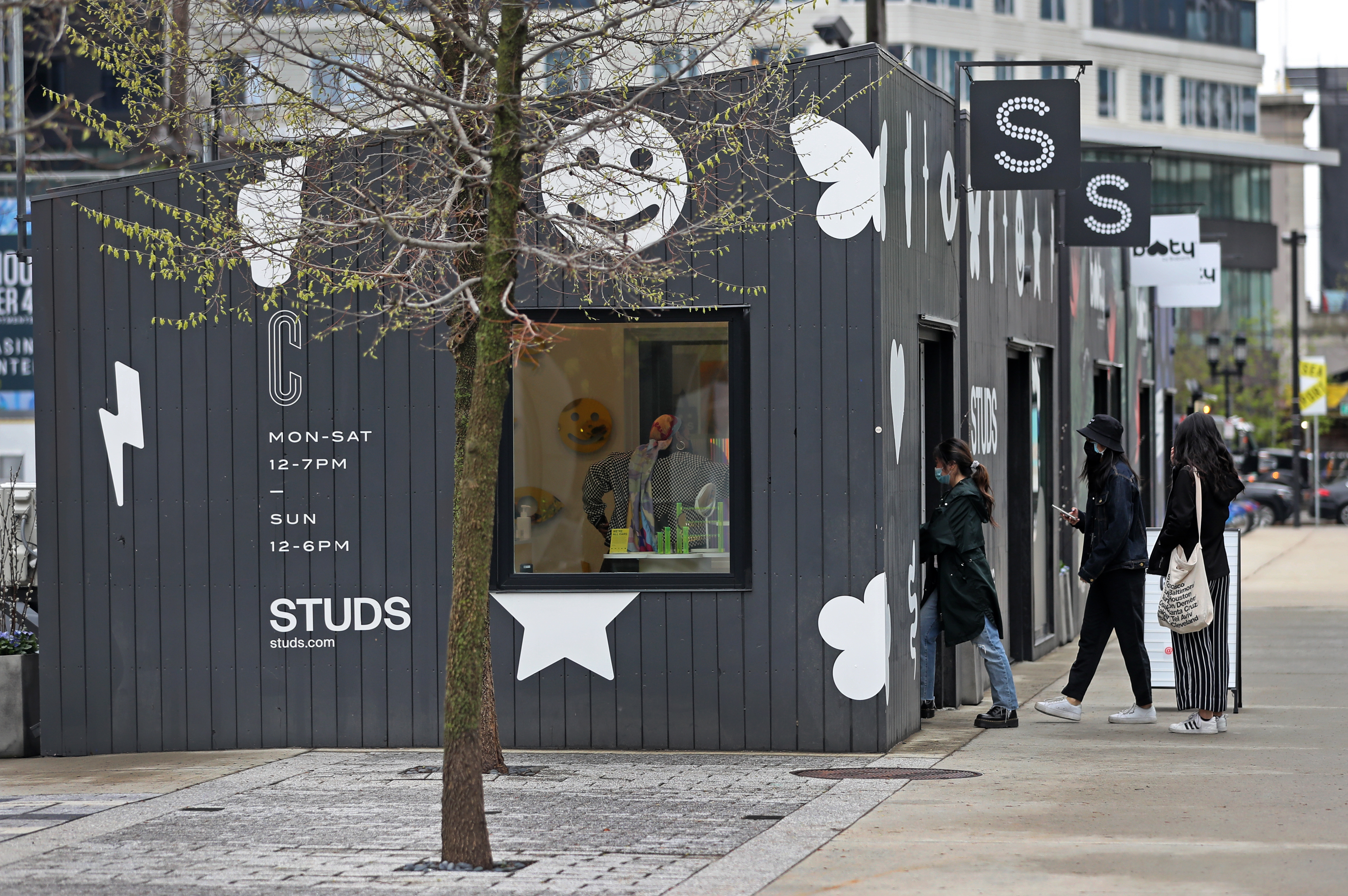 Customers walk into Studs at The Current in the Seaport District.