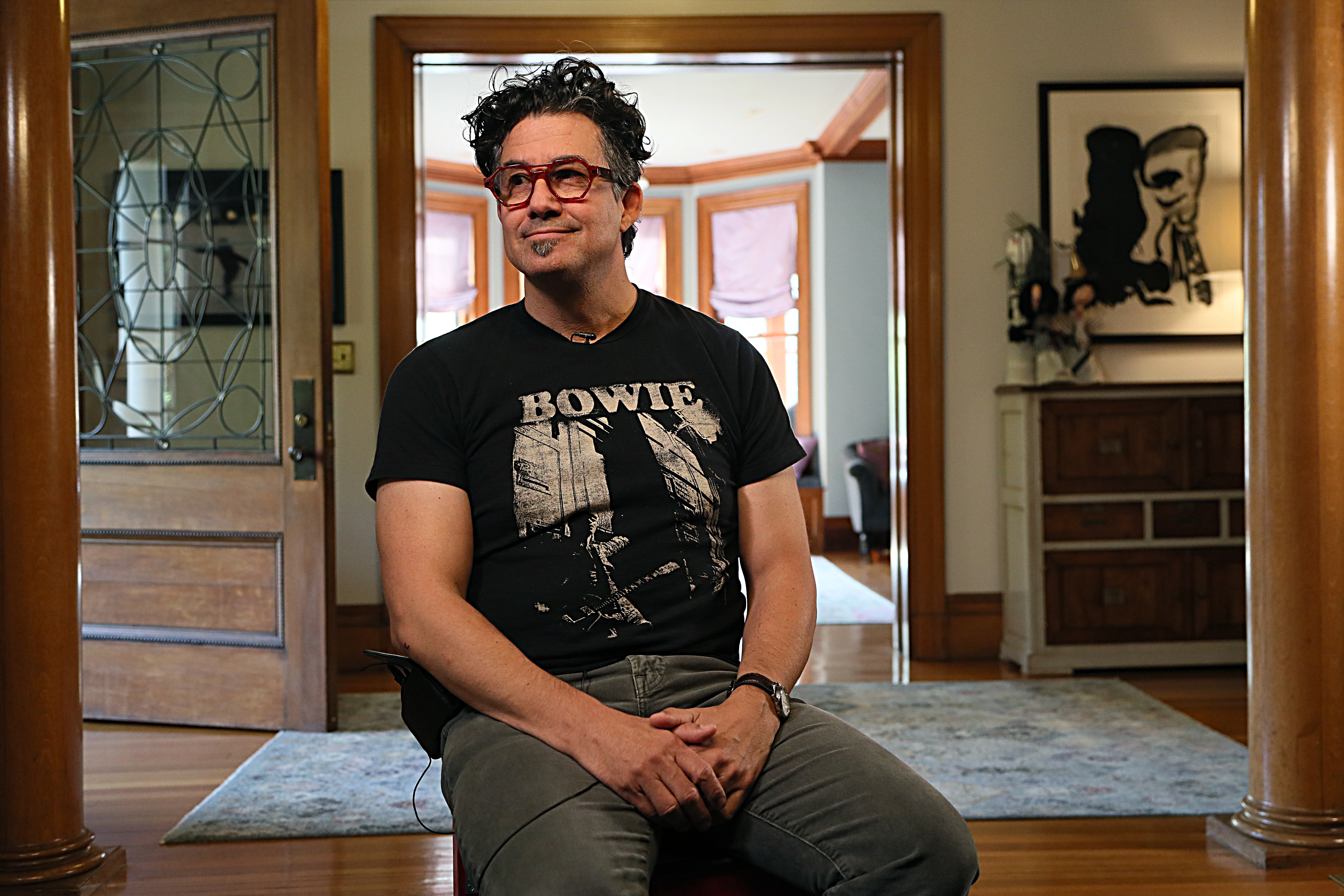 Derrick Rossi, one of the founders of Moderna, in his Newton home.