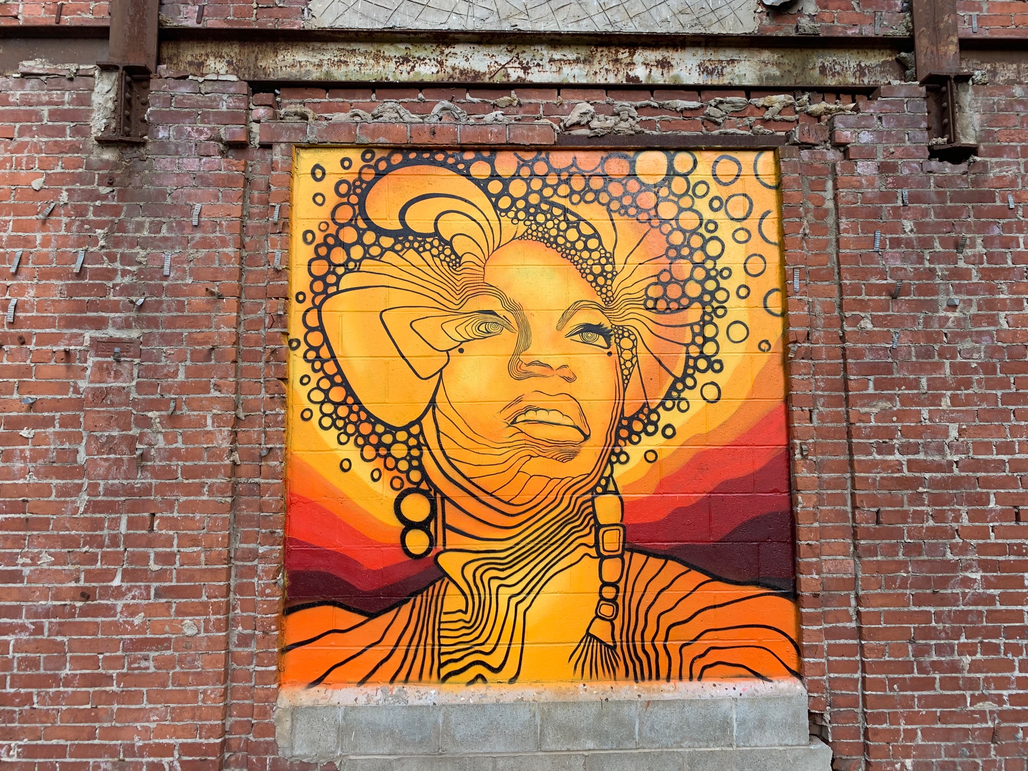 Providence’s street murals address concrete issues, plus flights of ...