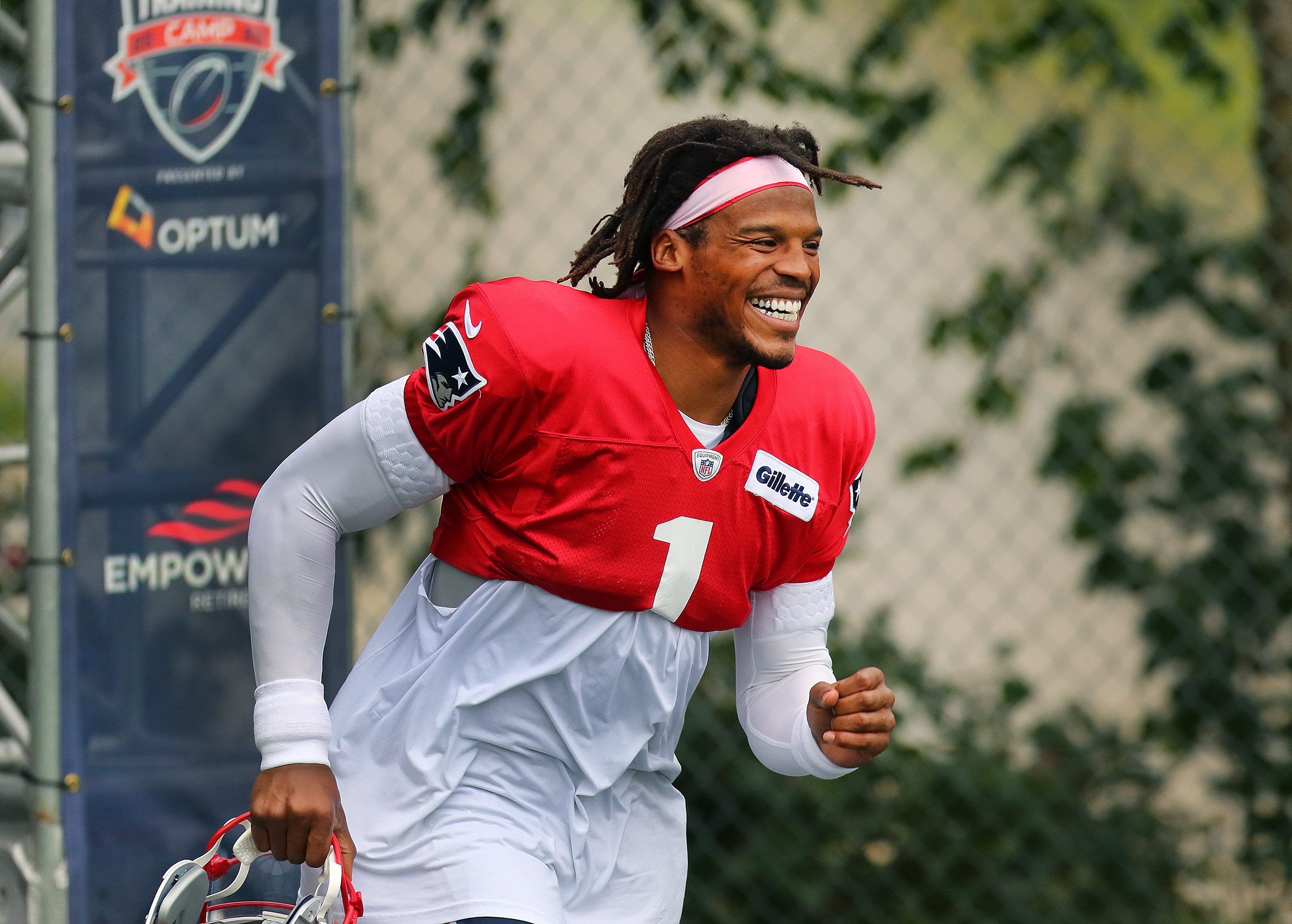 Cam Newton hits the practice field before a recent workout in Foxborough.