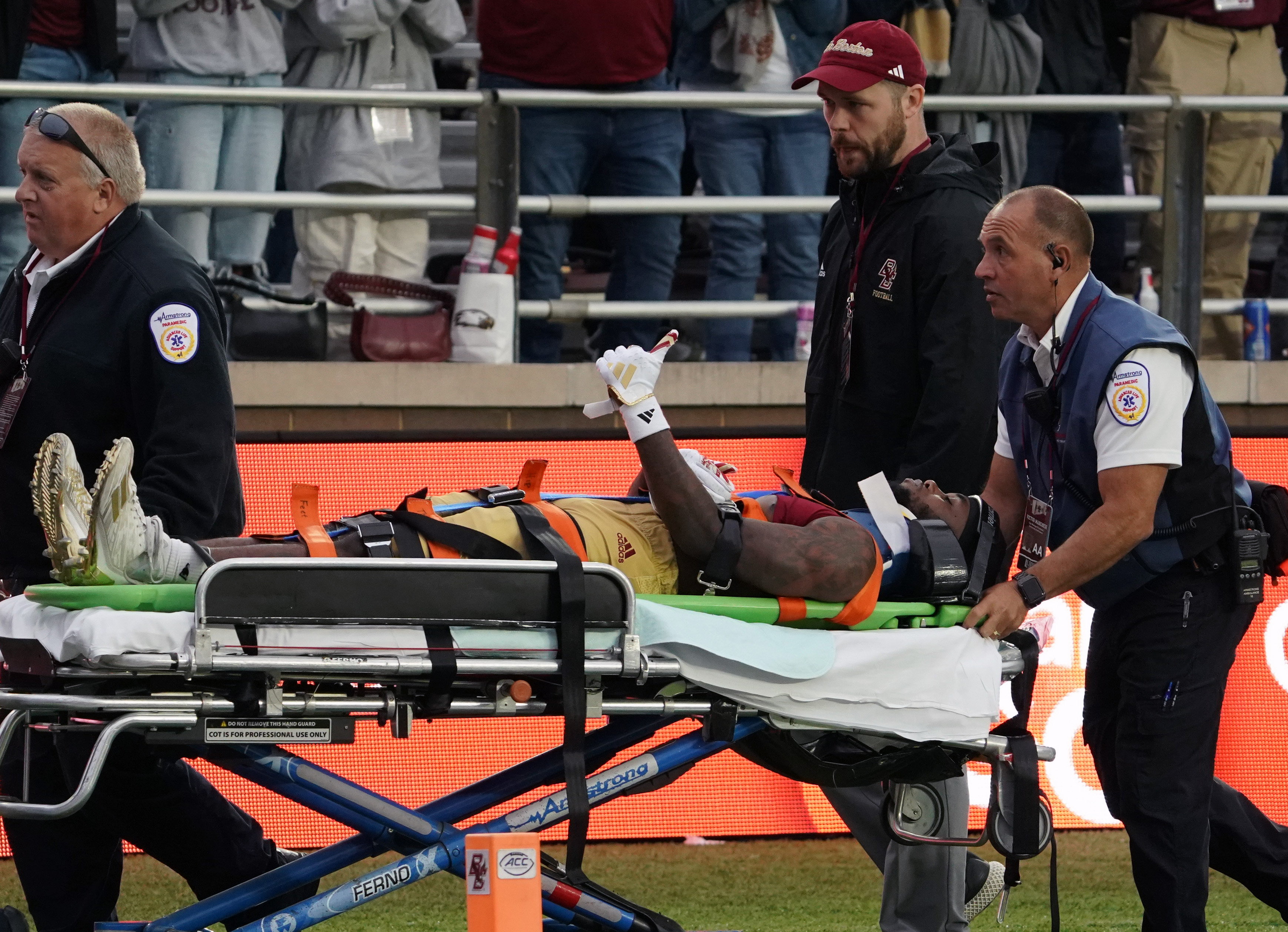 Two Eagles players stretchered off field after neck injuries during game