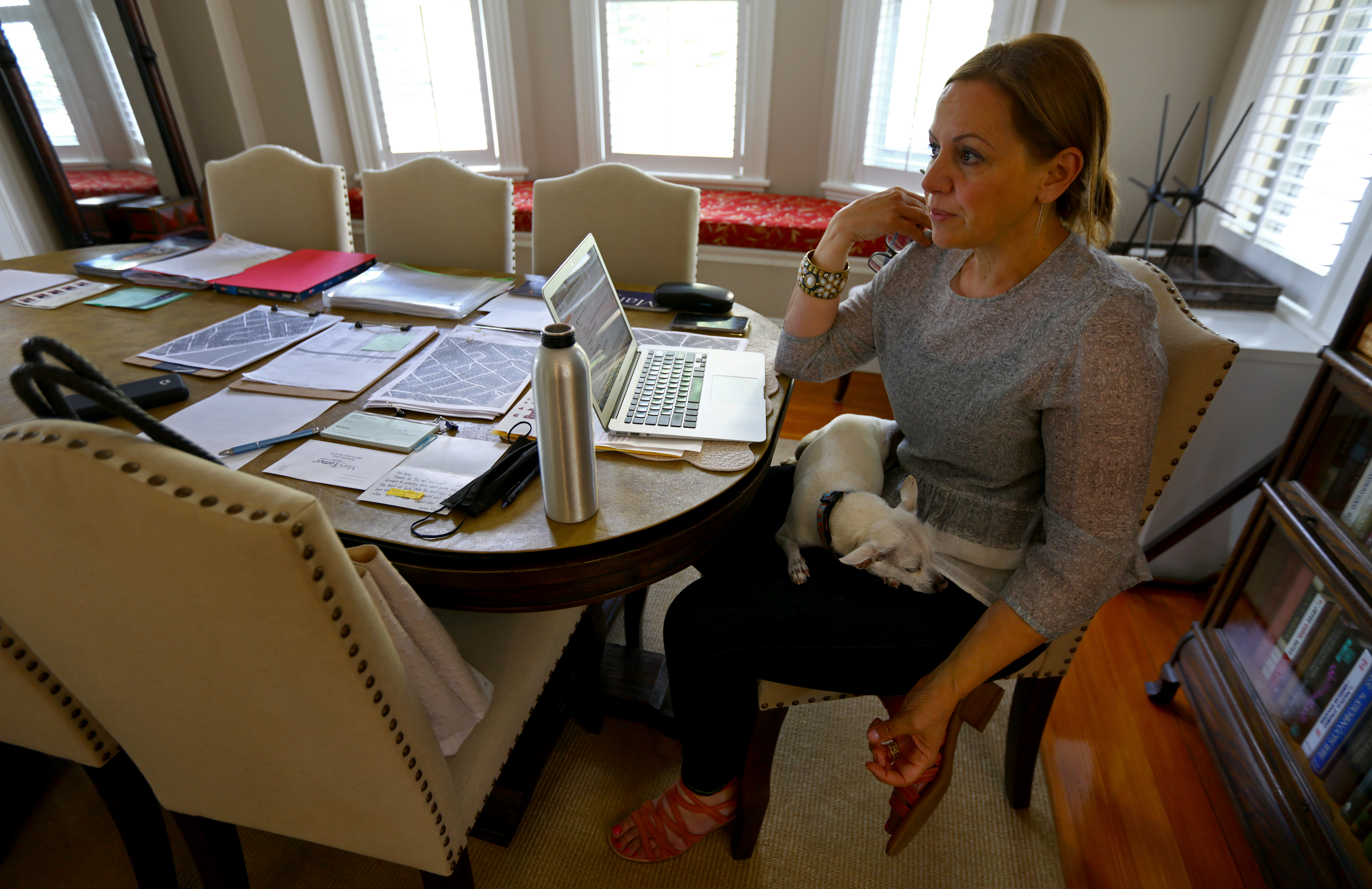 Mary Tamer is a candidate for Boston City Council. She works at home on campaign financing, with her 23-year-old campaign manager Crane Friedman.