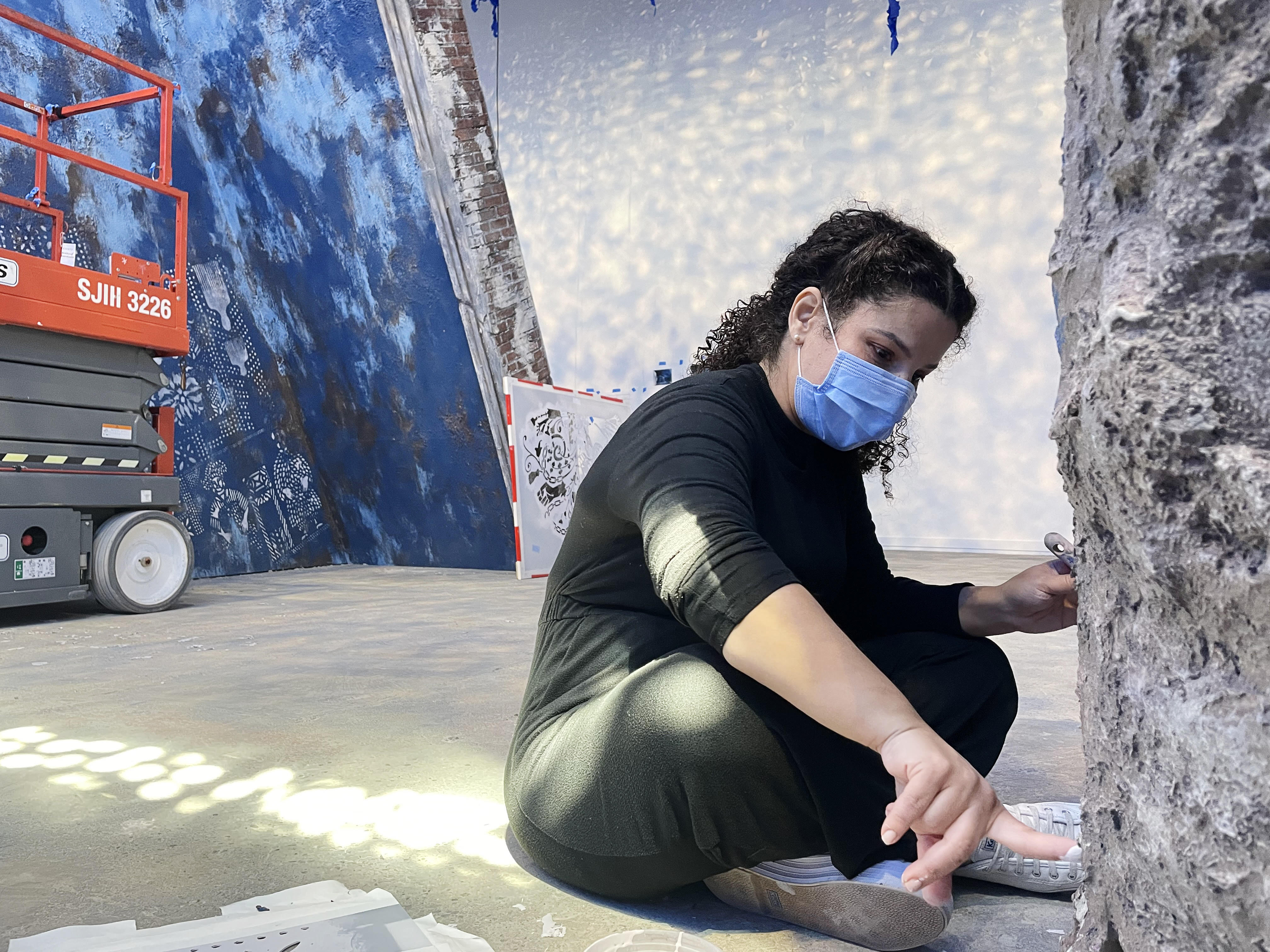 Firelei Báez painted her work with brushes and fingers at the ICA Watershed.