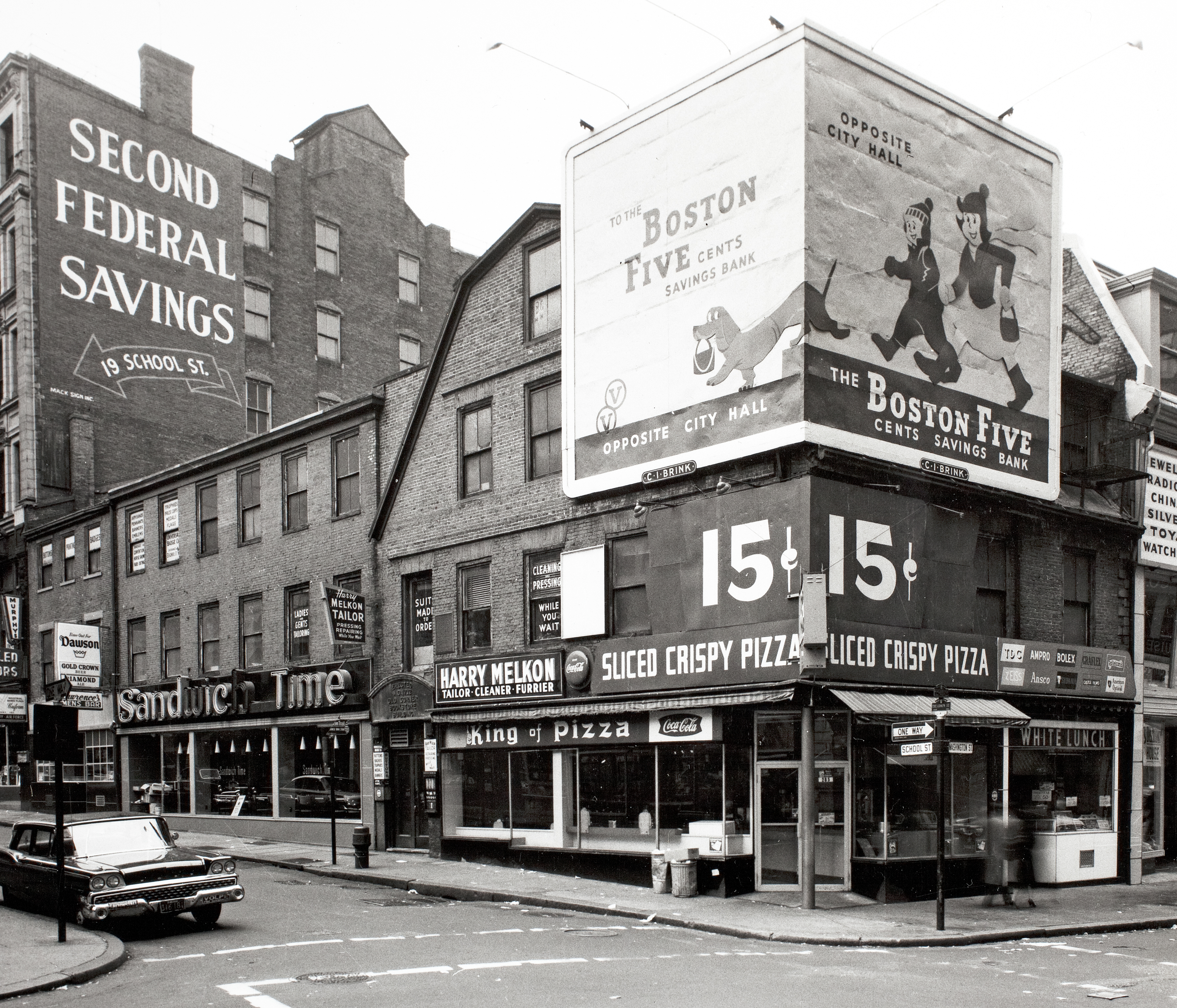 Five decades or so ago an unsightly billboard towered over one of Boston's oldest buildings, the Old Corner Bookstore.