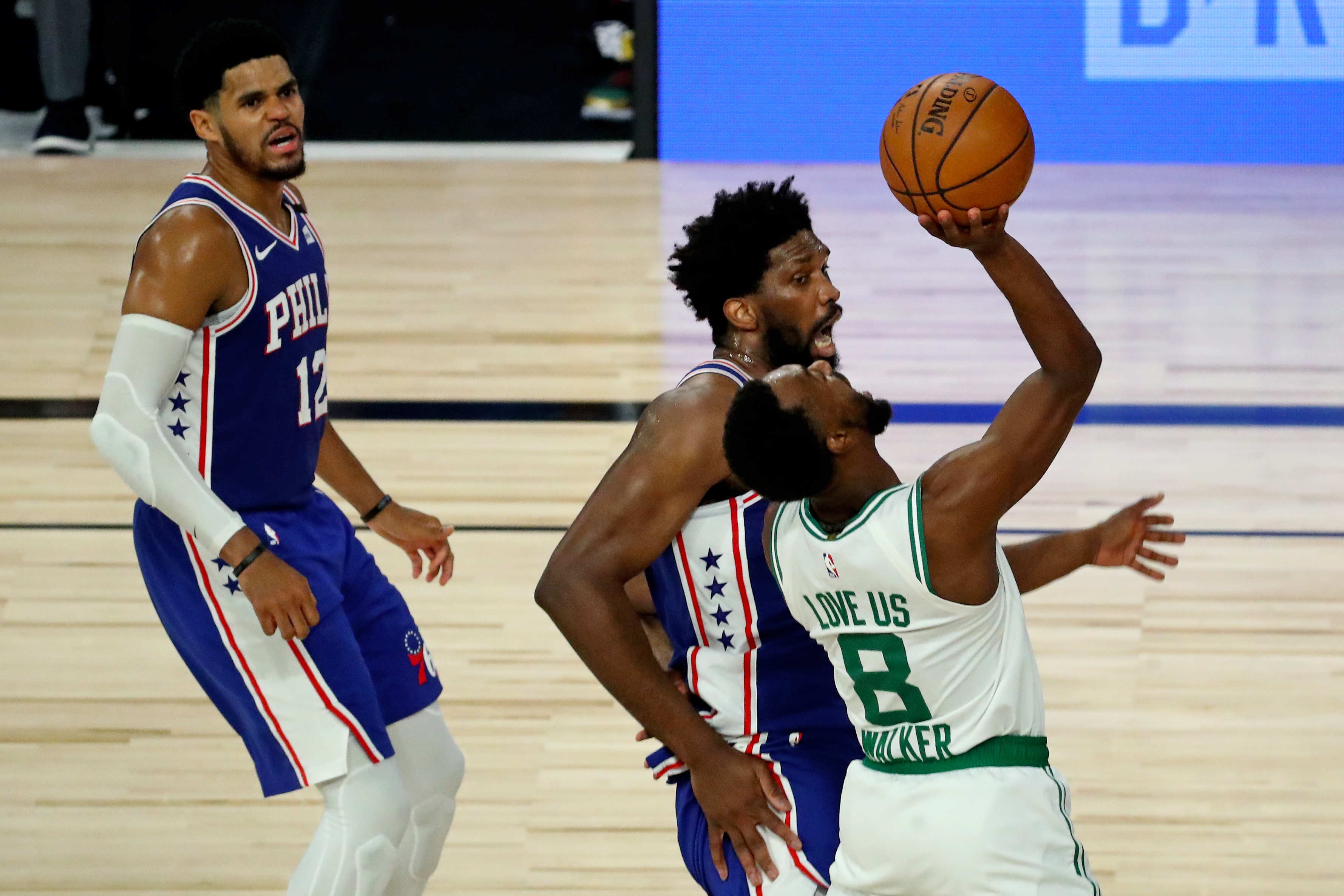 Despite a massive advantage inside, Joel Embiid (21) and the Sixers just haven't been able to keep up with the Celtics this week.