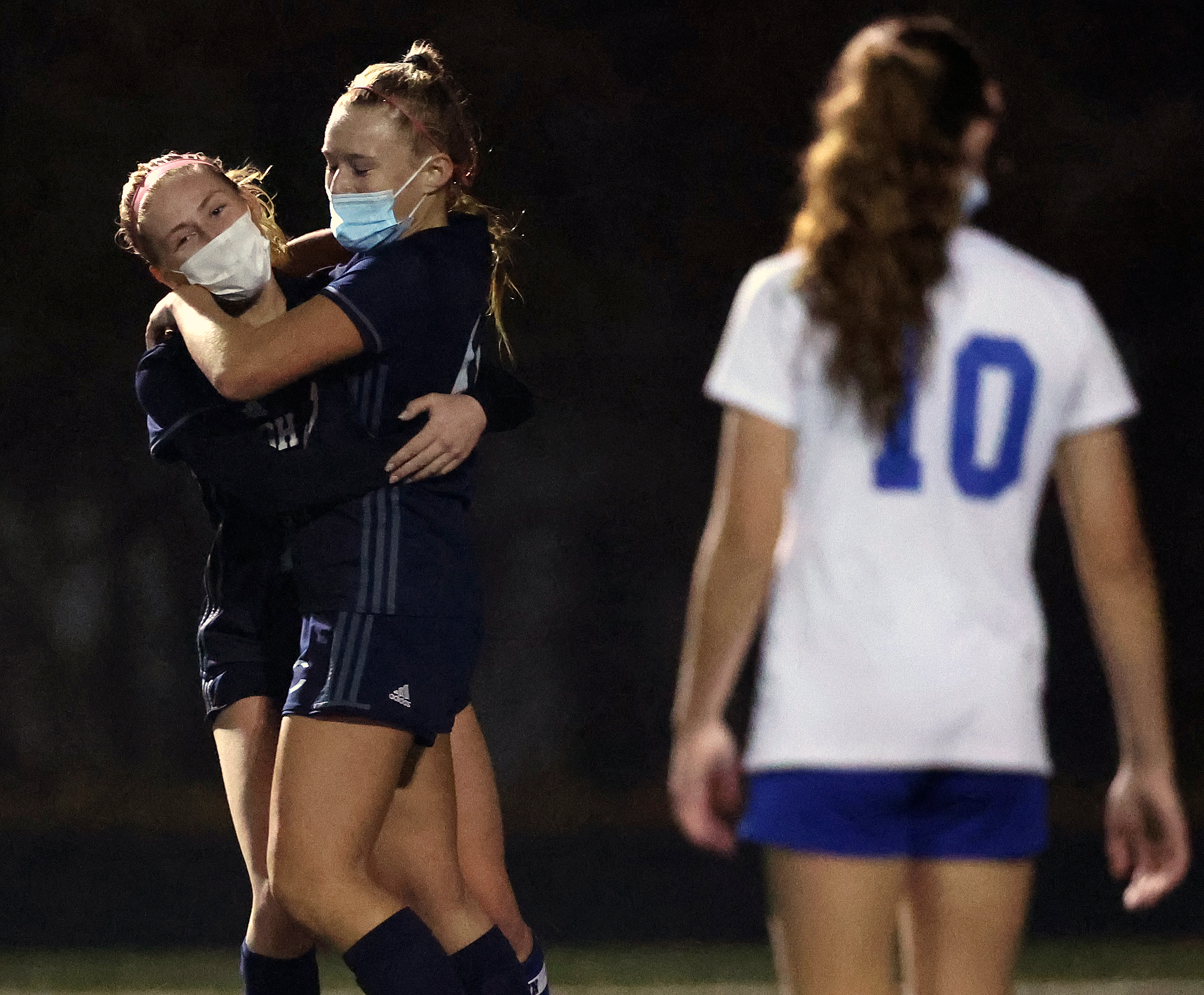 Cohasset's Anna Grech (10) and Mackenzie Osborne (18) celebrate after Osborne connected for a 2-0 lead over Hull on Friday night.