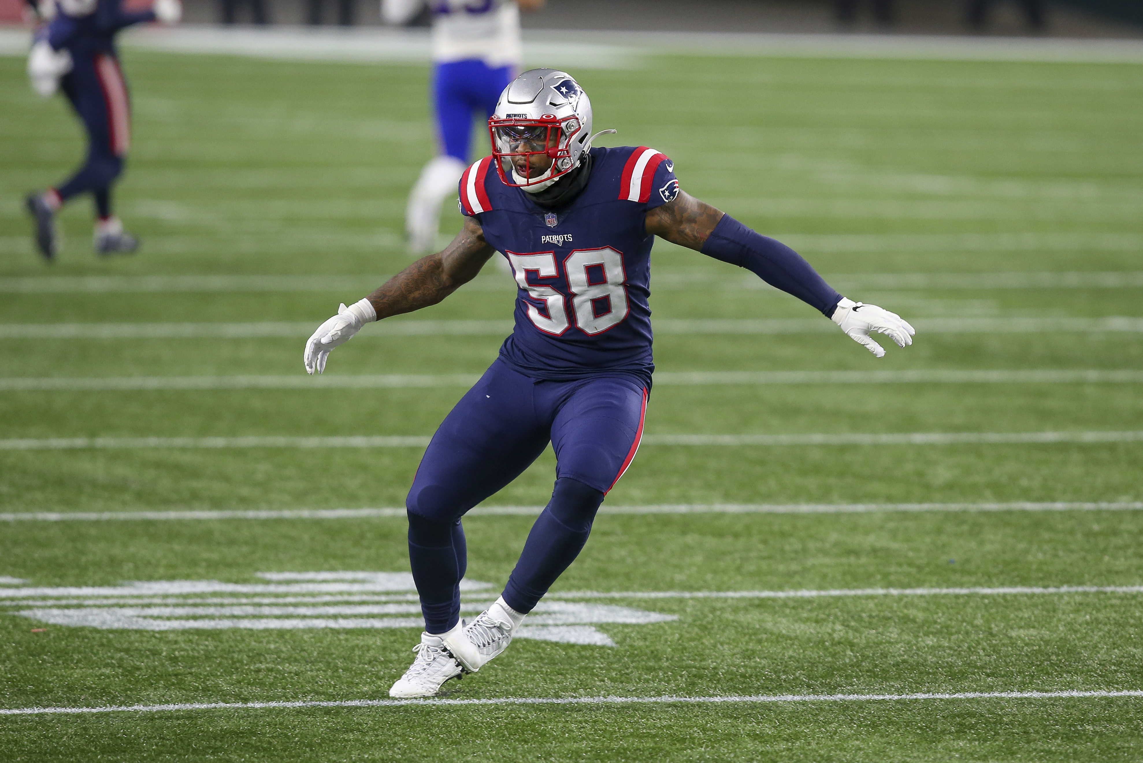 New England Patriots linebacker Anfernee Jennings (58) defends during the  second half of an NFL football game against the Chicago Bears, Monday, Oct.  24, 2022, in Foxborough, Mass. (AP Photo/Stew Milne Stock