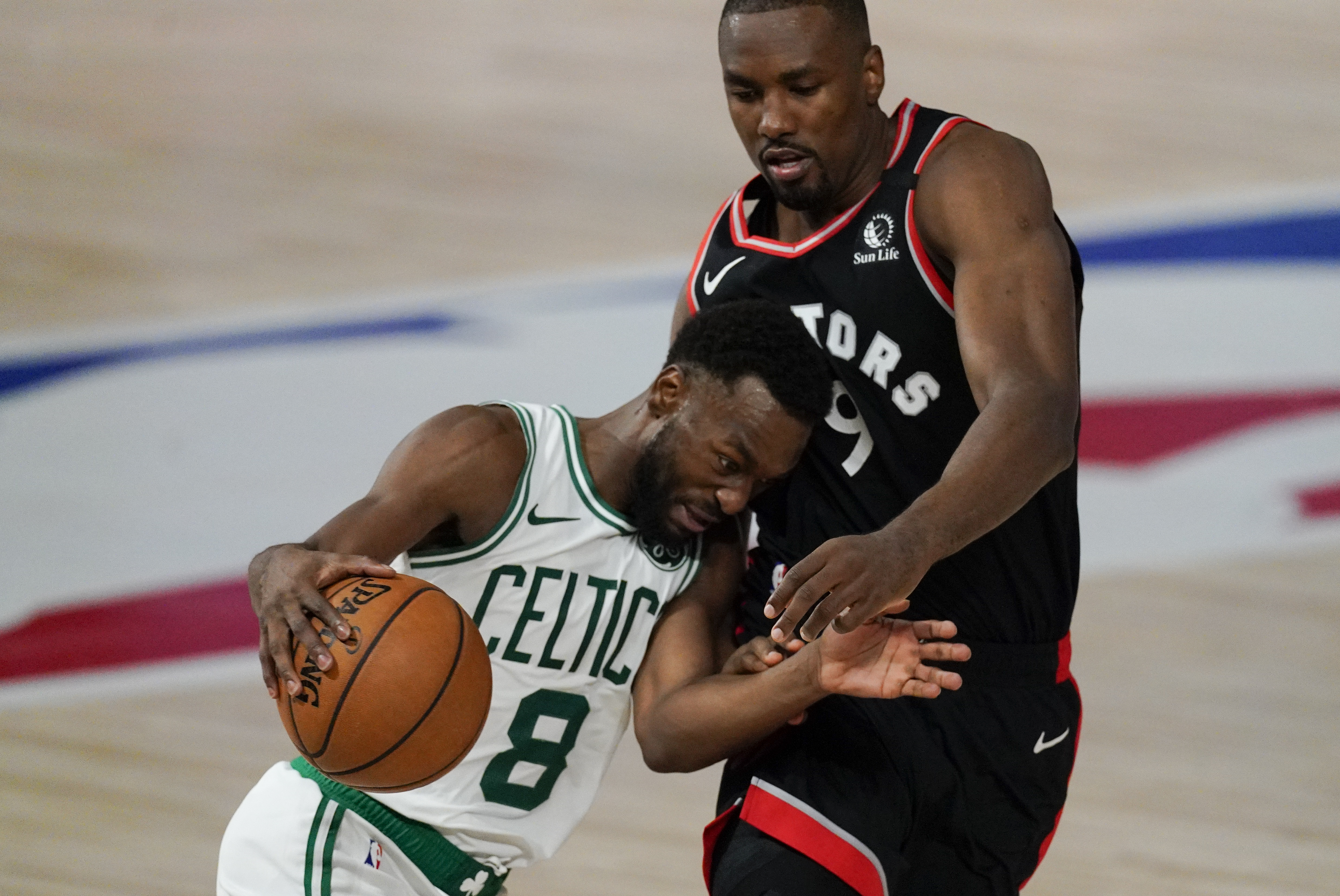 The Celtics' Kemba Walker found it tough going against the Raptors' Serge Ibaka during Boston's Game 4 loss.