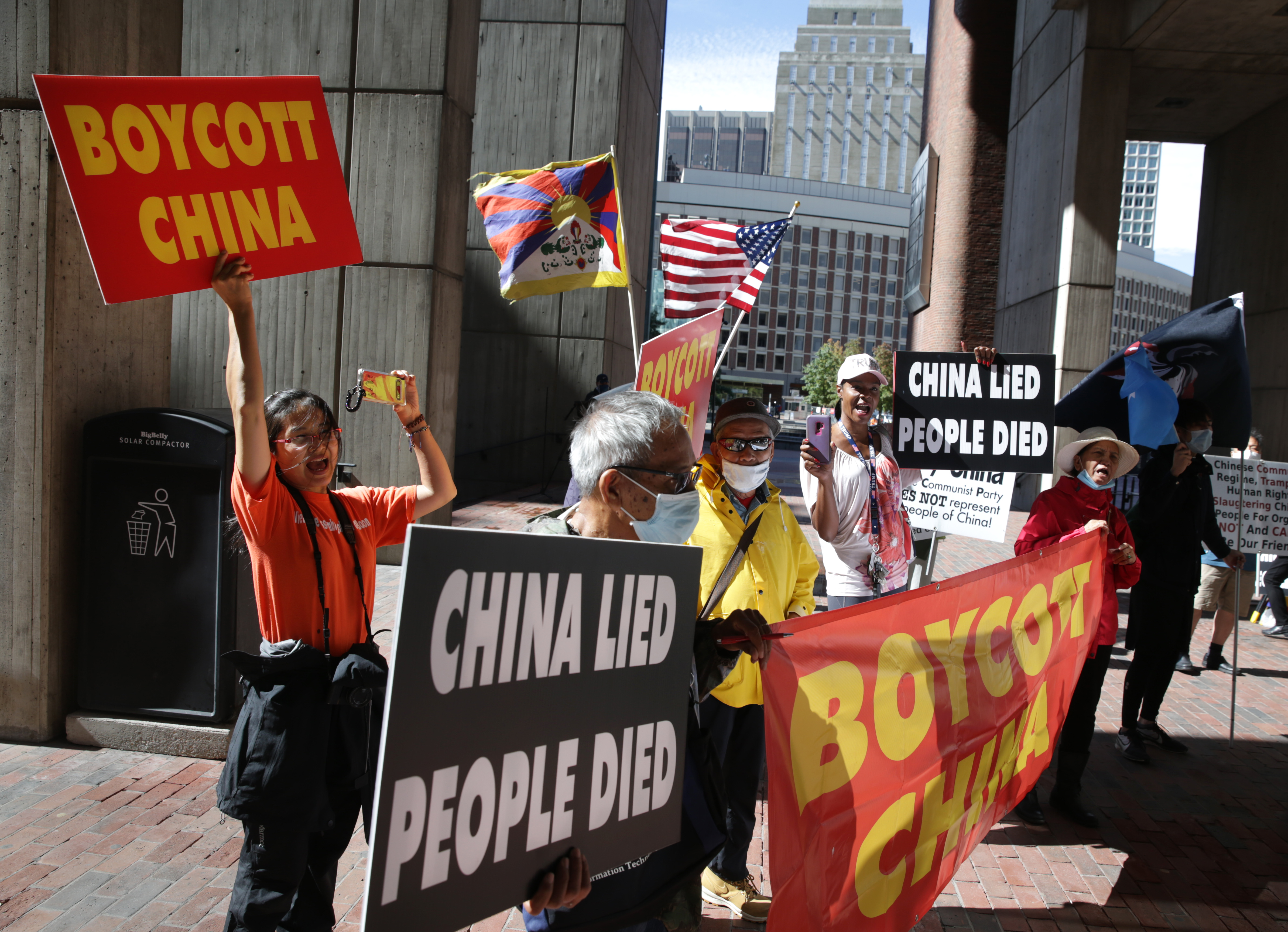 Protesters at Boston City Hall demonstrating against the Chinese flag flying over City Hall.