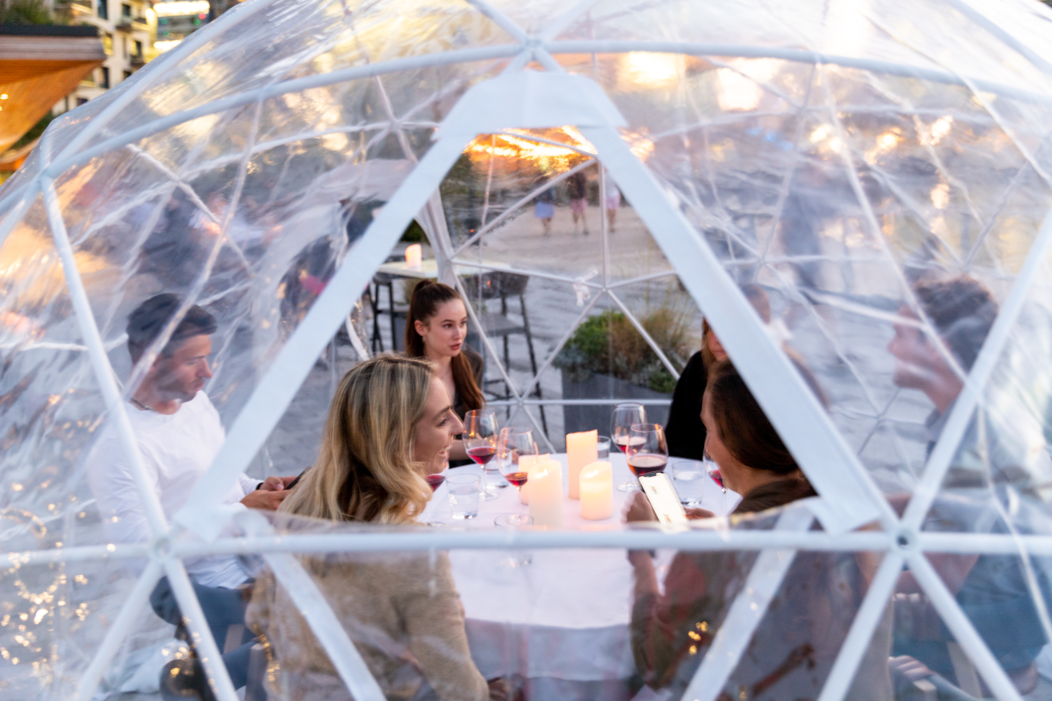 Woods Hill Pier 4 has reopened four igloos where up to six people can dine together “outdoors” in each heated dome.