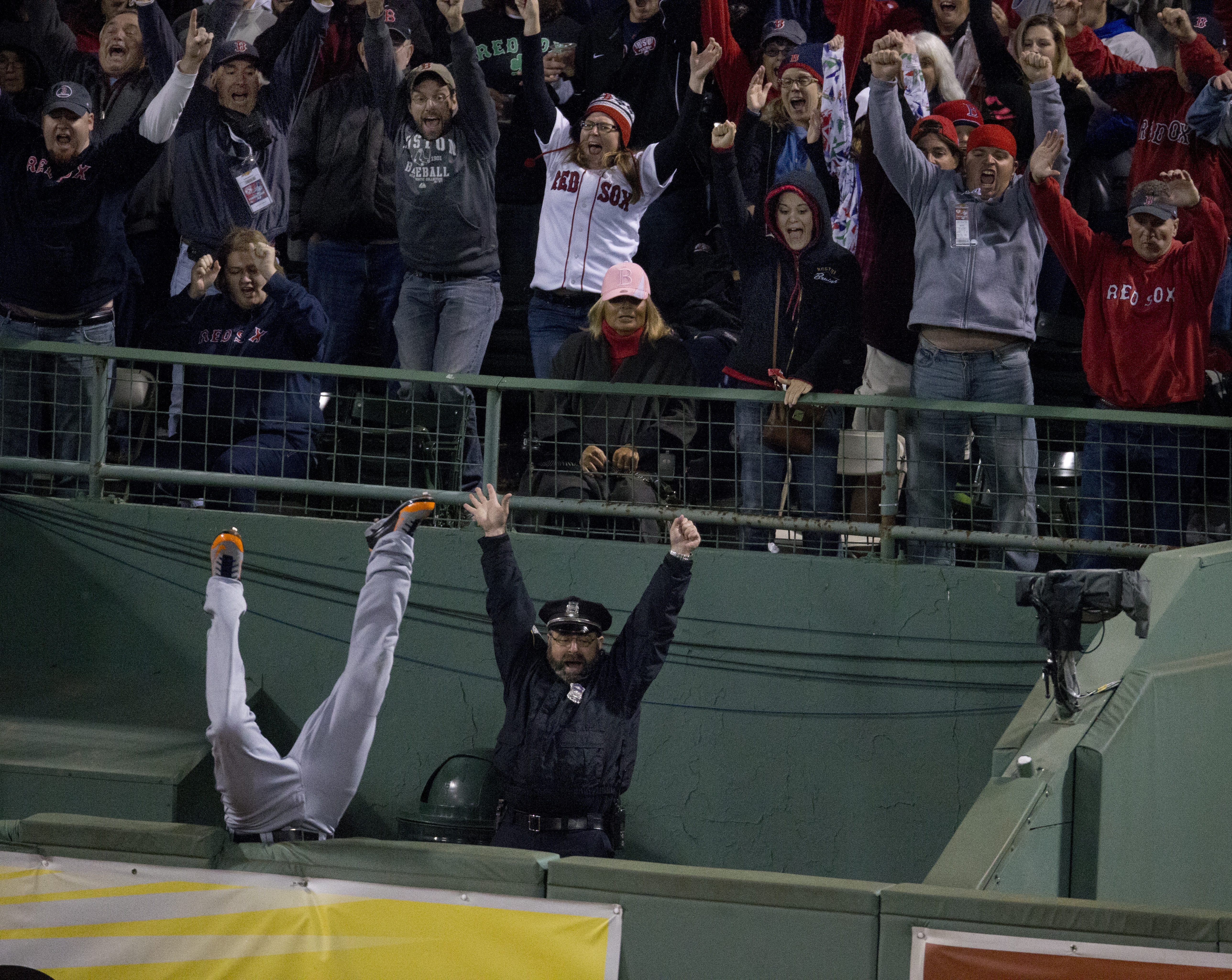 Who could forget this moment? Torii Hunter flipped into the bullpen while failing to grab an Ortiz homer in the eighth inning of Game 2 of the ALCS against the Tigers Oct. 13.