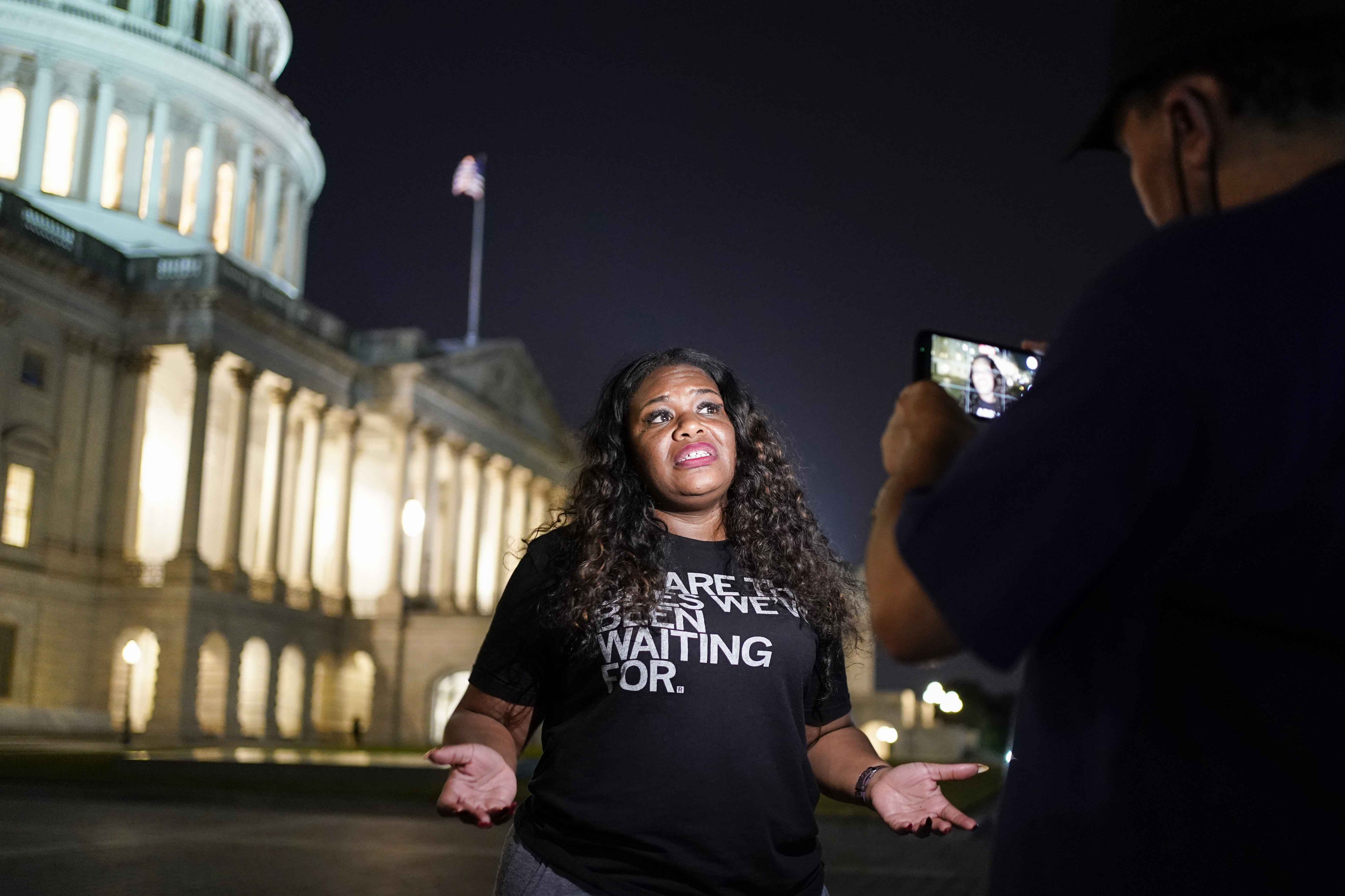 Rep. Cori Bush (D-MO) speaks with supporters as she spends the night outside the U.S. Capitol to call for for an extension of the federal eviction moratorium on July 31, 2021 in Washington, DC.