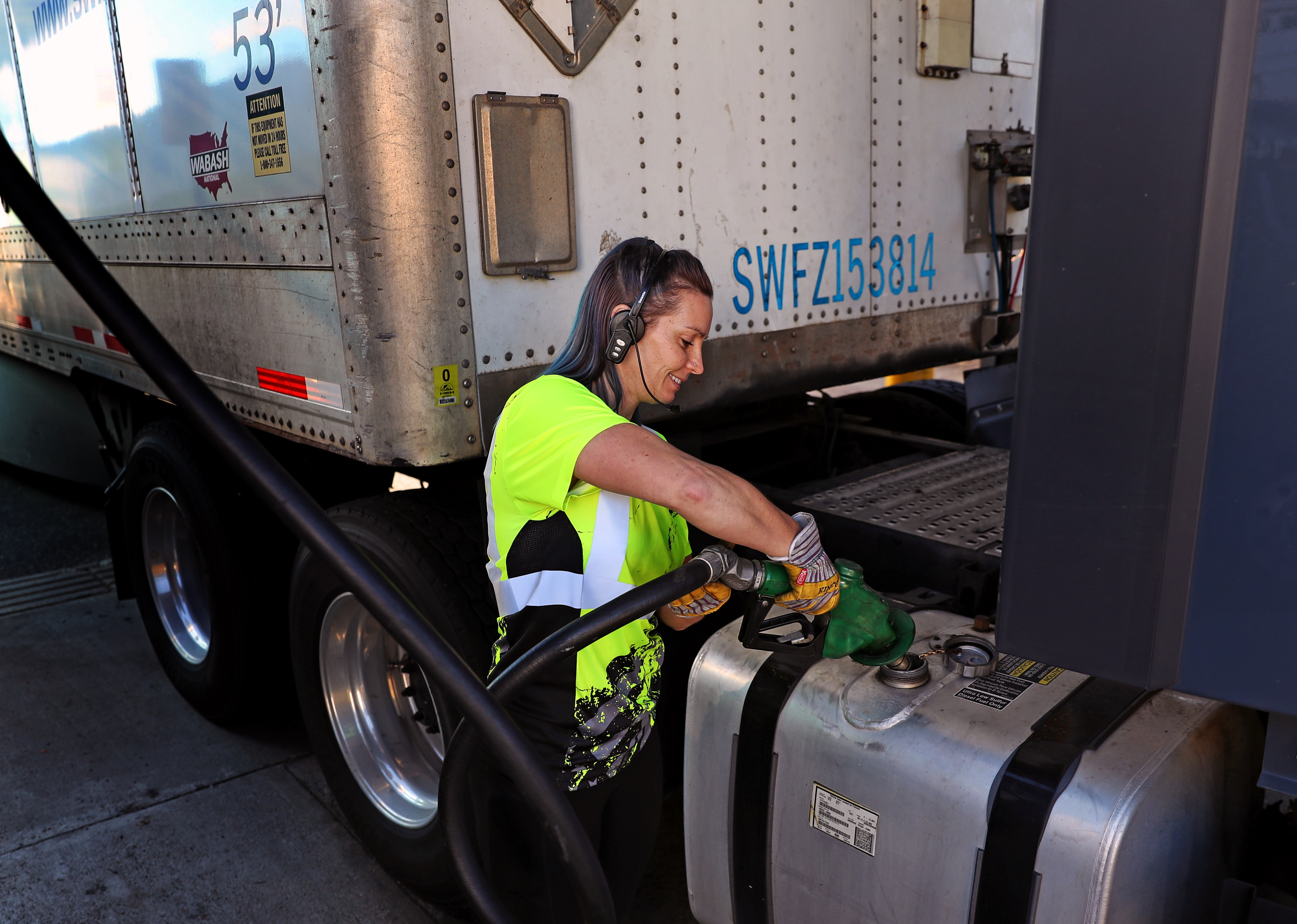 Sheree Lingua of Connecticut, who retired from a previous job, fueled up her truck in Framingham on the Massachusetts Turnpike.
