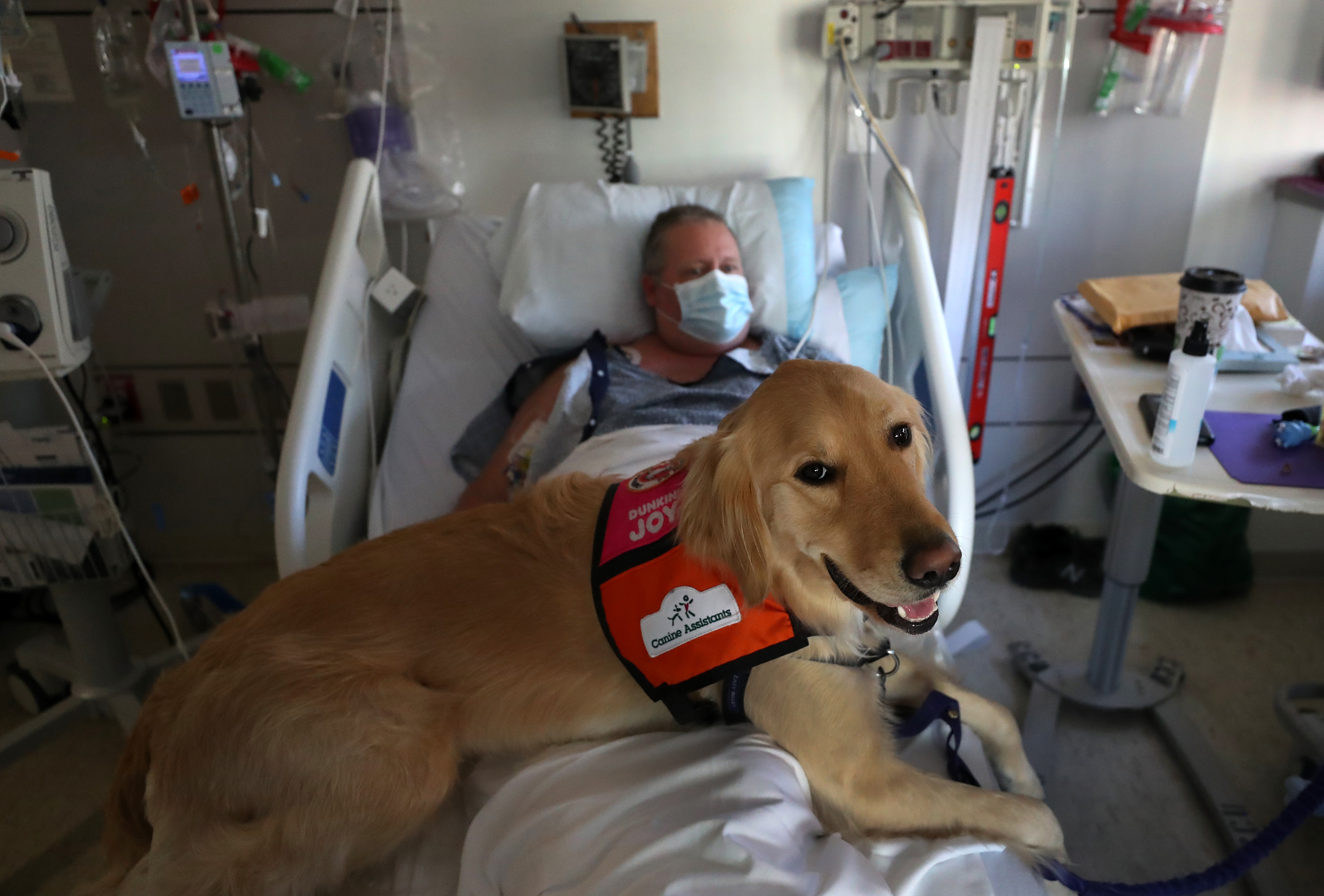 Charlie West is happy when Bob makes his rounds at Tufts Medical Center.