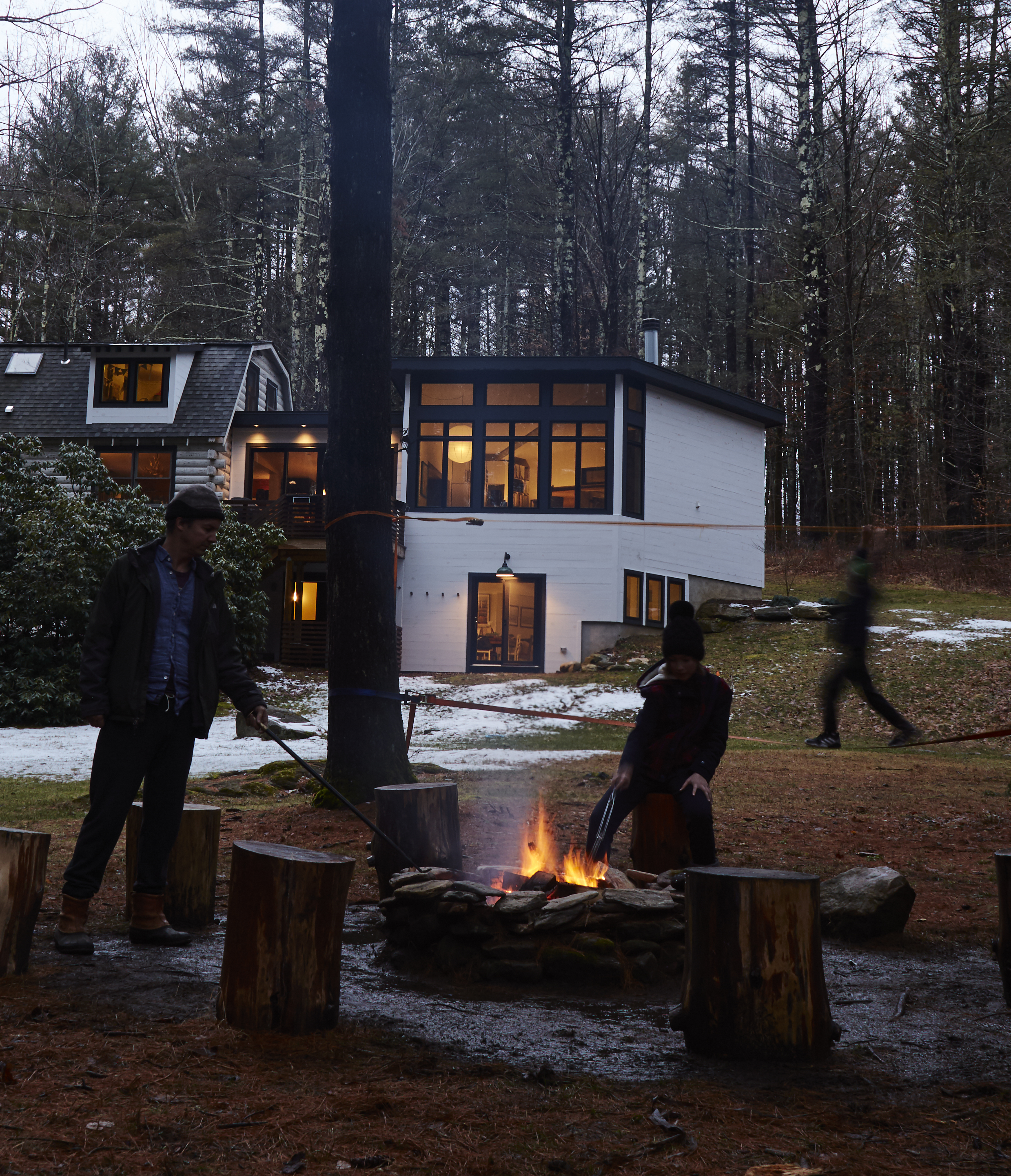 The family enjoys the firepit in the
backyard (they finished the walk-out basement during the pandemic).