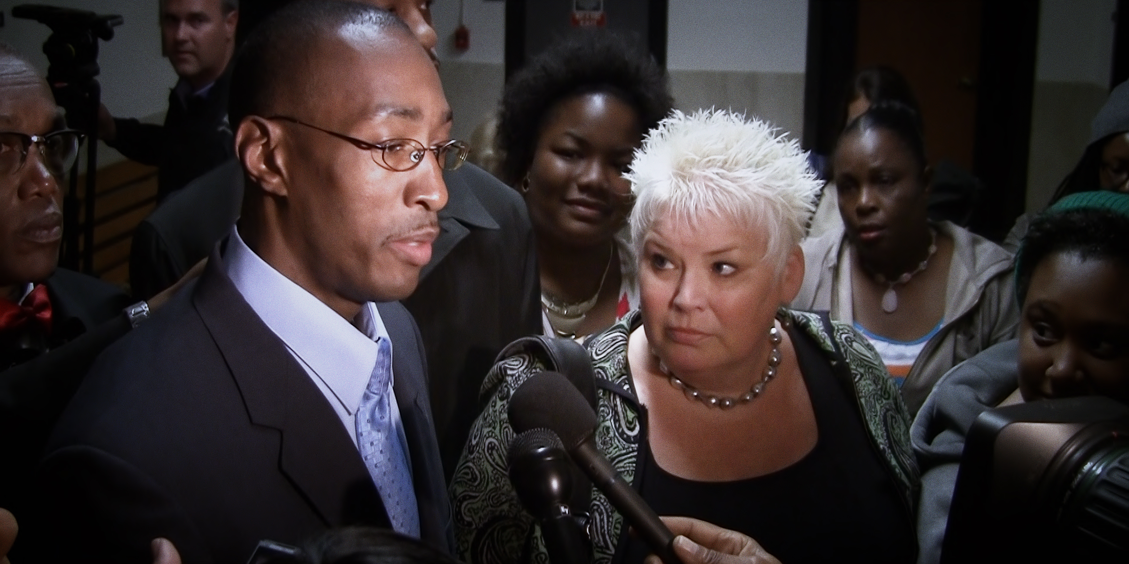Sean Ellis with his lawyer, Rosemary Scapicchio, in a scene from Netflix's "Trial 4" series.