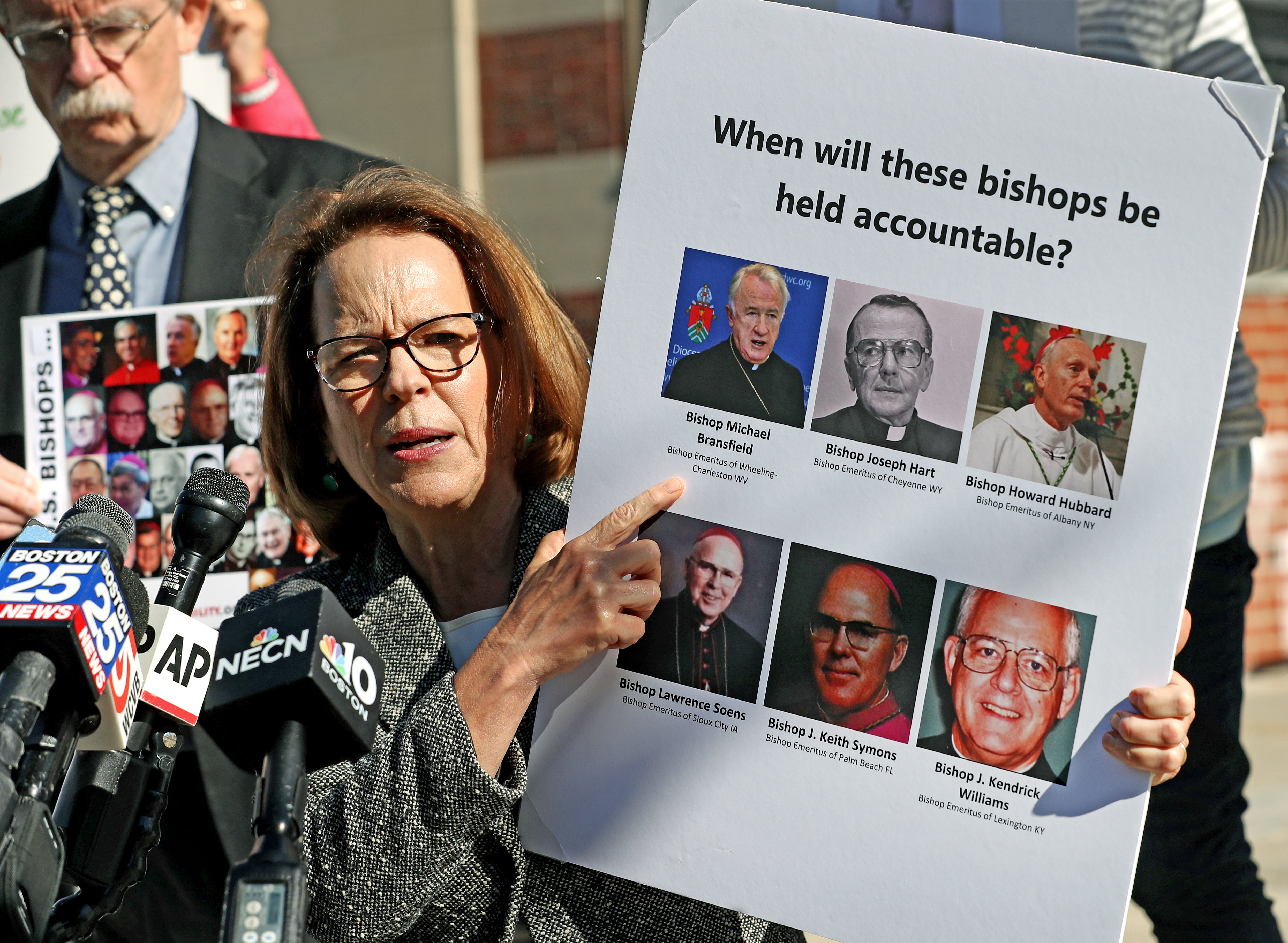 Anne Barrett Doyle, co-director of Bishop Accountability, spoke outside Dedham District Court.