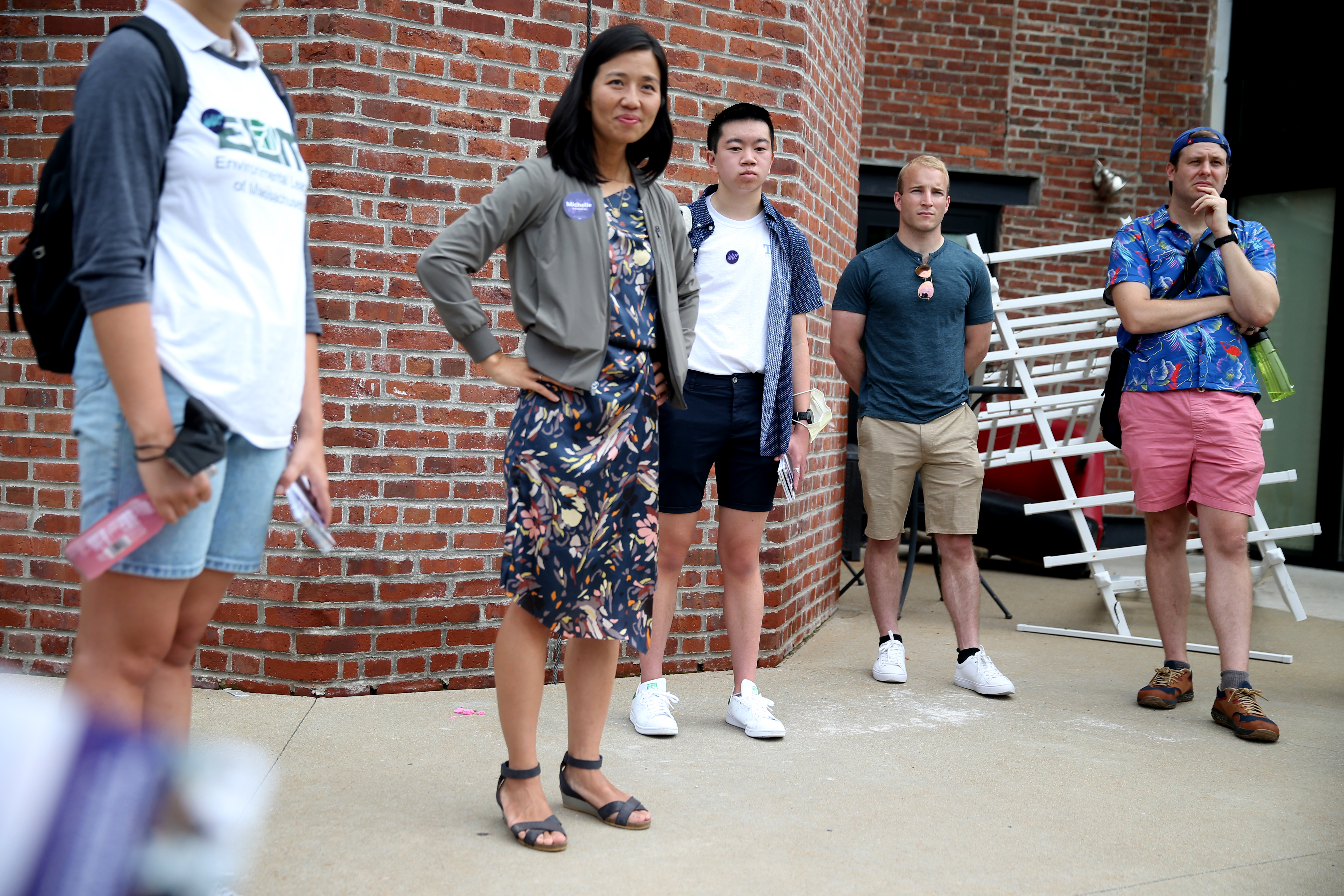 Boston mayoral candidate City Councilor Michelle Wu spoke with a group of canvassers in Jamaica Plain.