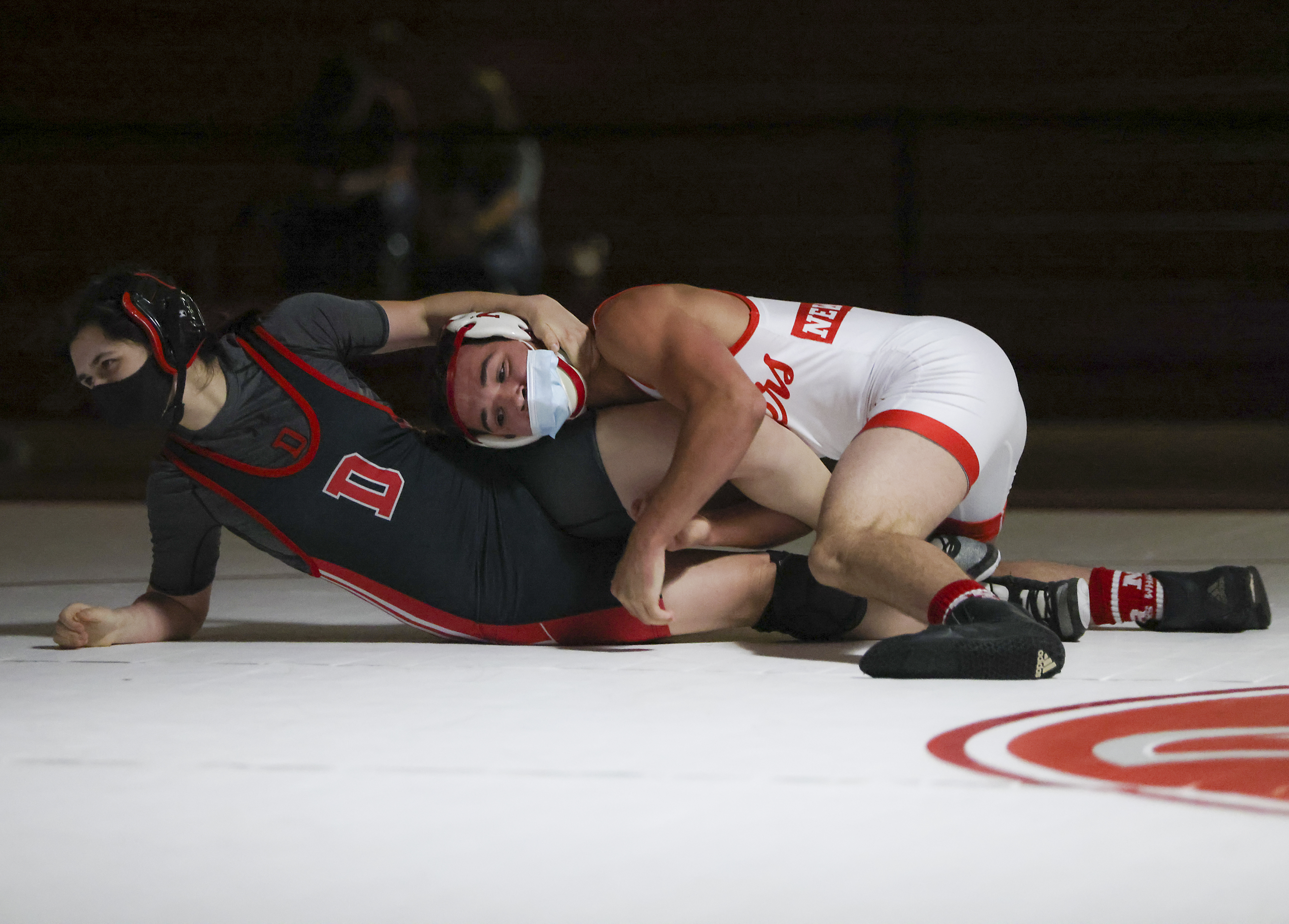 New Bedford's Jizaiah Lopes, easily pinning Durfee High’s Alysha Rasat during a recent dual meet at New Bedford, said his team has never shied away from a challenge, taking on all comers.