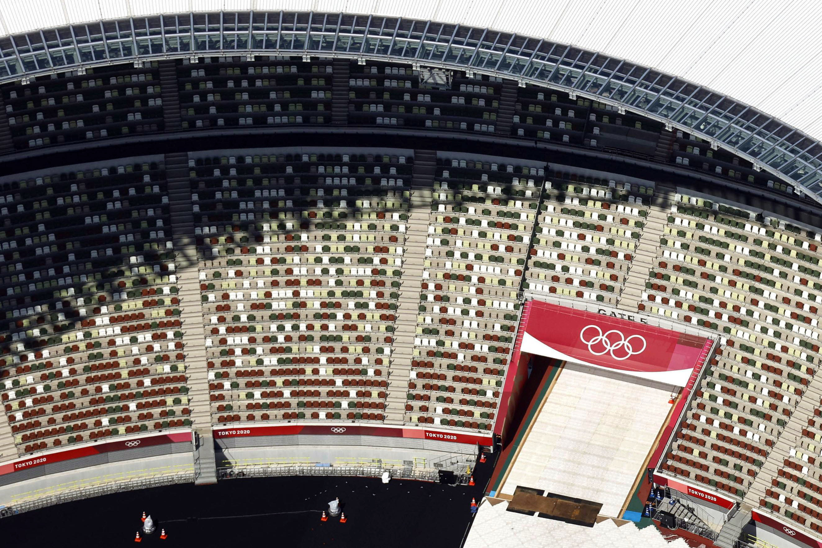 National Stadium in Tokyo will be empty of fans even once the Olympic Games begin Friday because of the ongoing pandemic and rising infection rates.