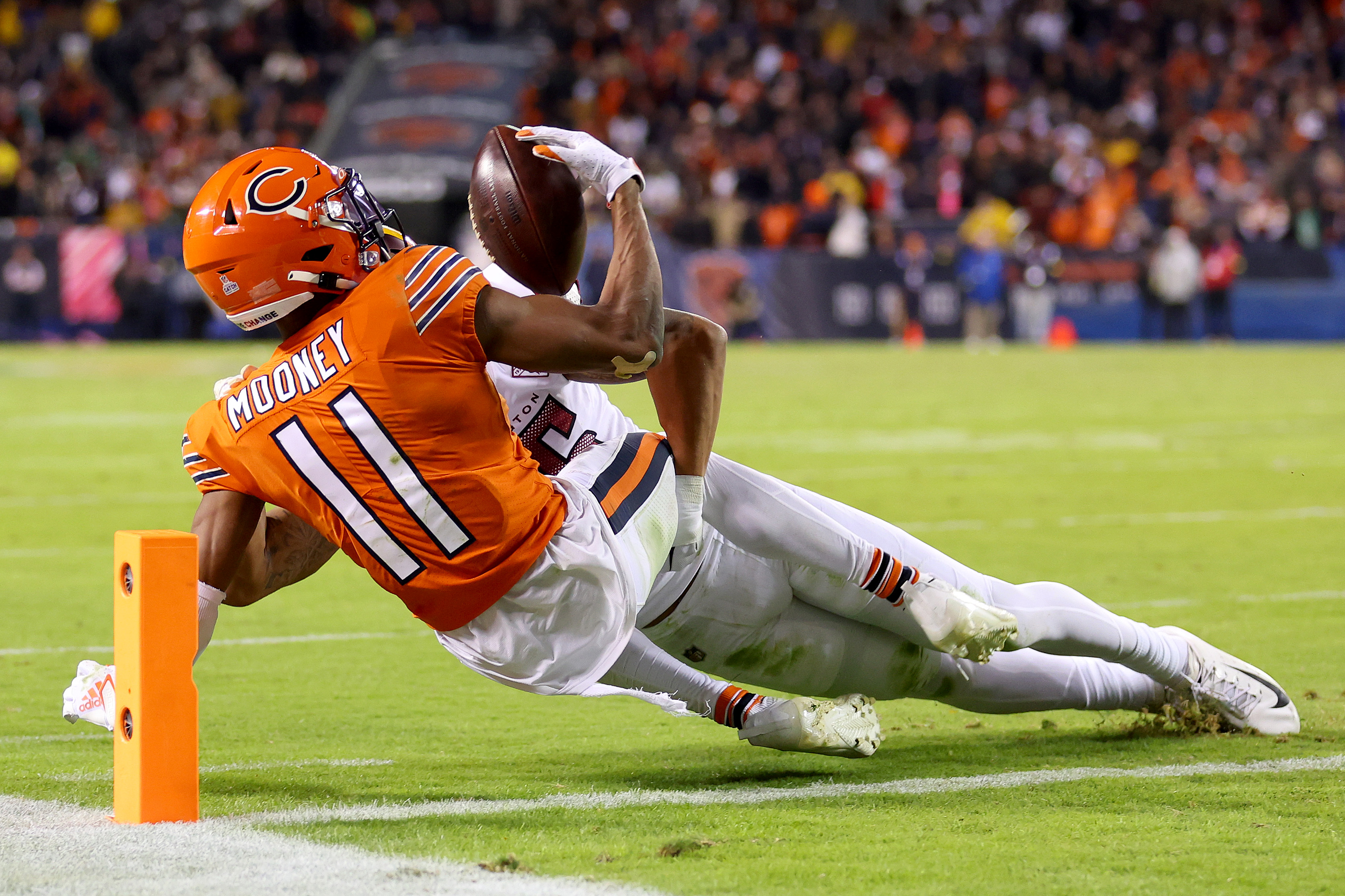 Chicago Bears quarterback Justin Fields runs against the Washington  Commanders in the second half of an NFL football game in Chicago, Thursday,  Oct. 13, 2022. The Commanders defeated the Bears 12-7. (AP