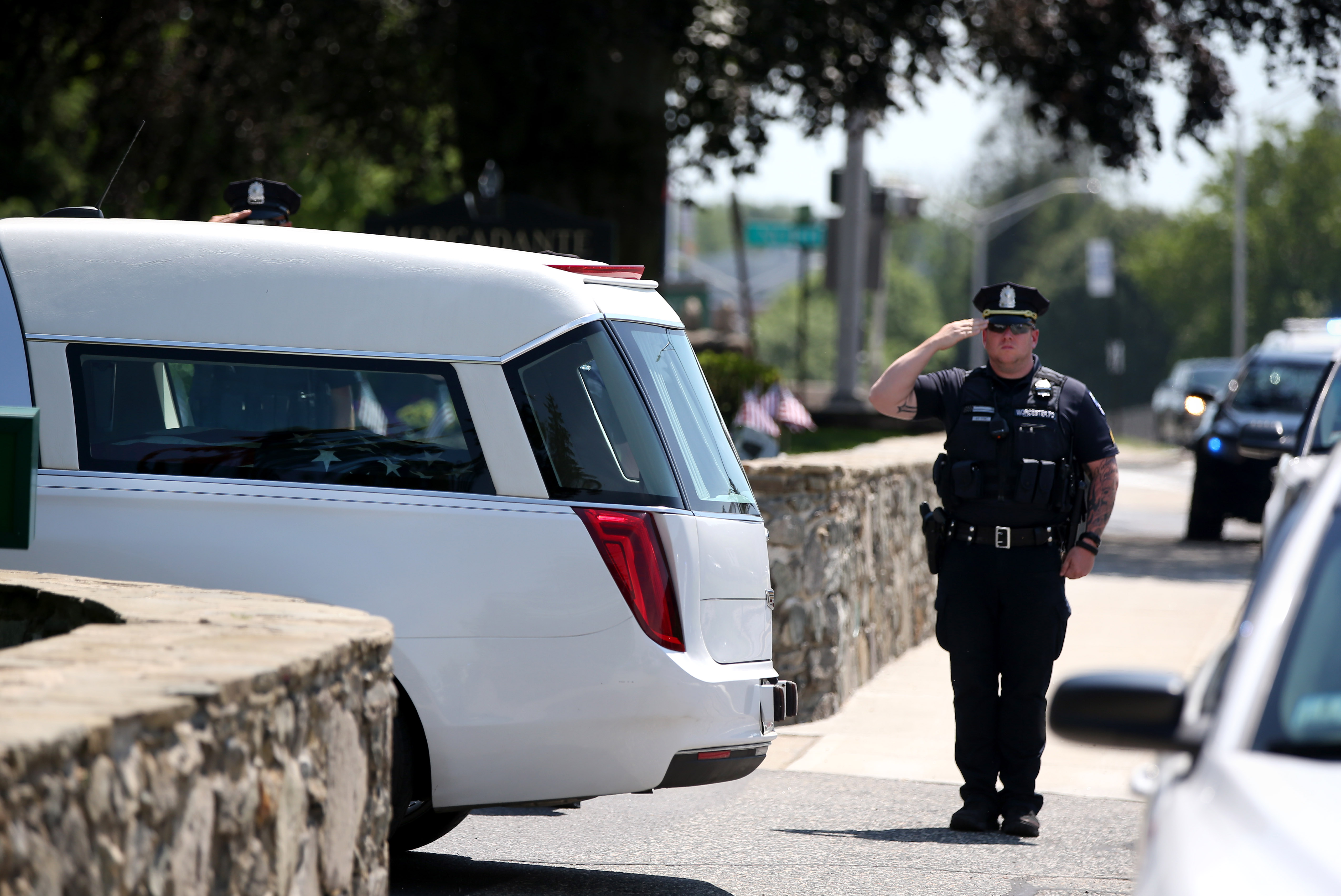 The body of Worcester Police officer Enmanuel Familia arrived at the Mercadante funeral home Saturday.
