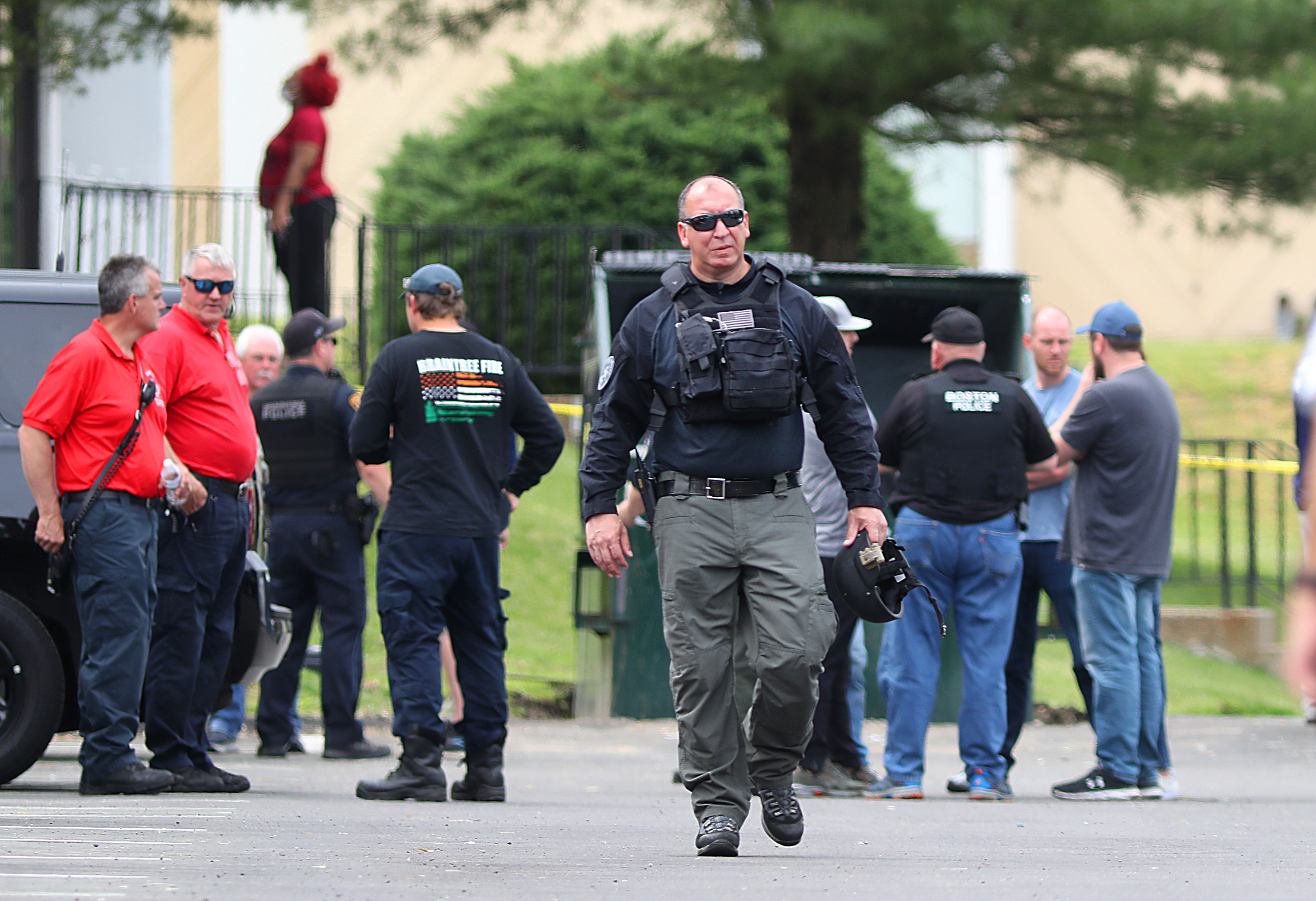 Police surveyed the scene at a Braintree apartment complex Friday.