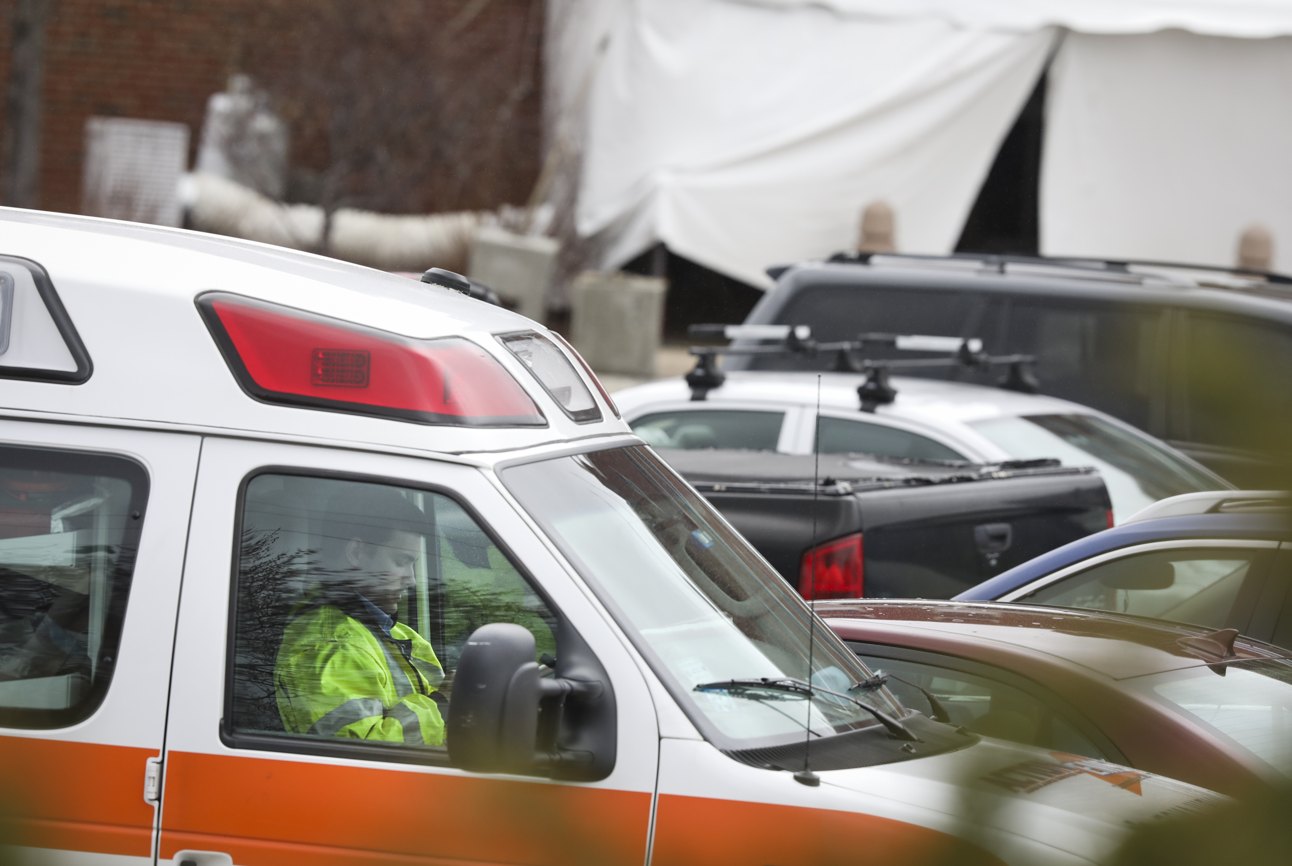 An ambulance driver sat outside of the Holyoke Soldiers' Home on Friday afternoon.