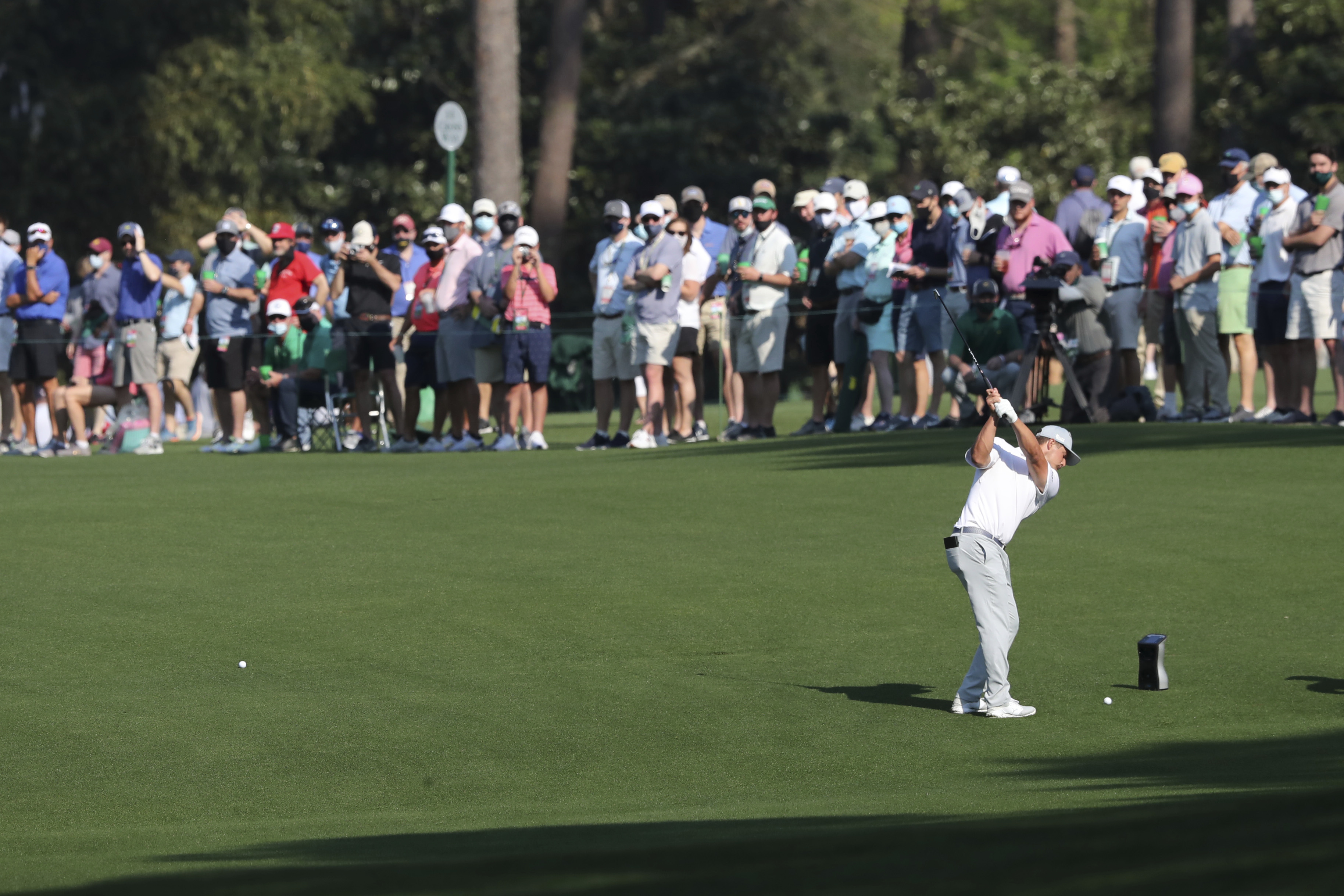 Bryson DeChambeau hits his fairway shot on the 13th hole during a practice round Wednesday at Augusta.
