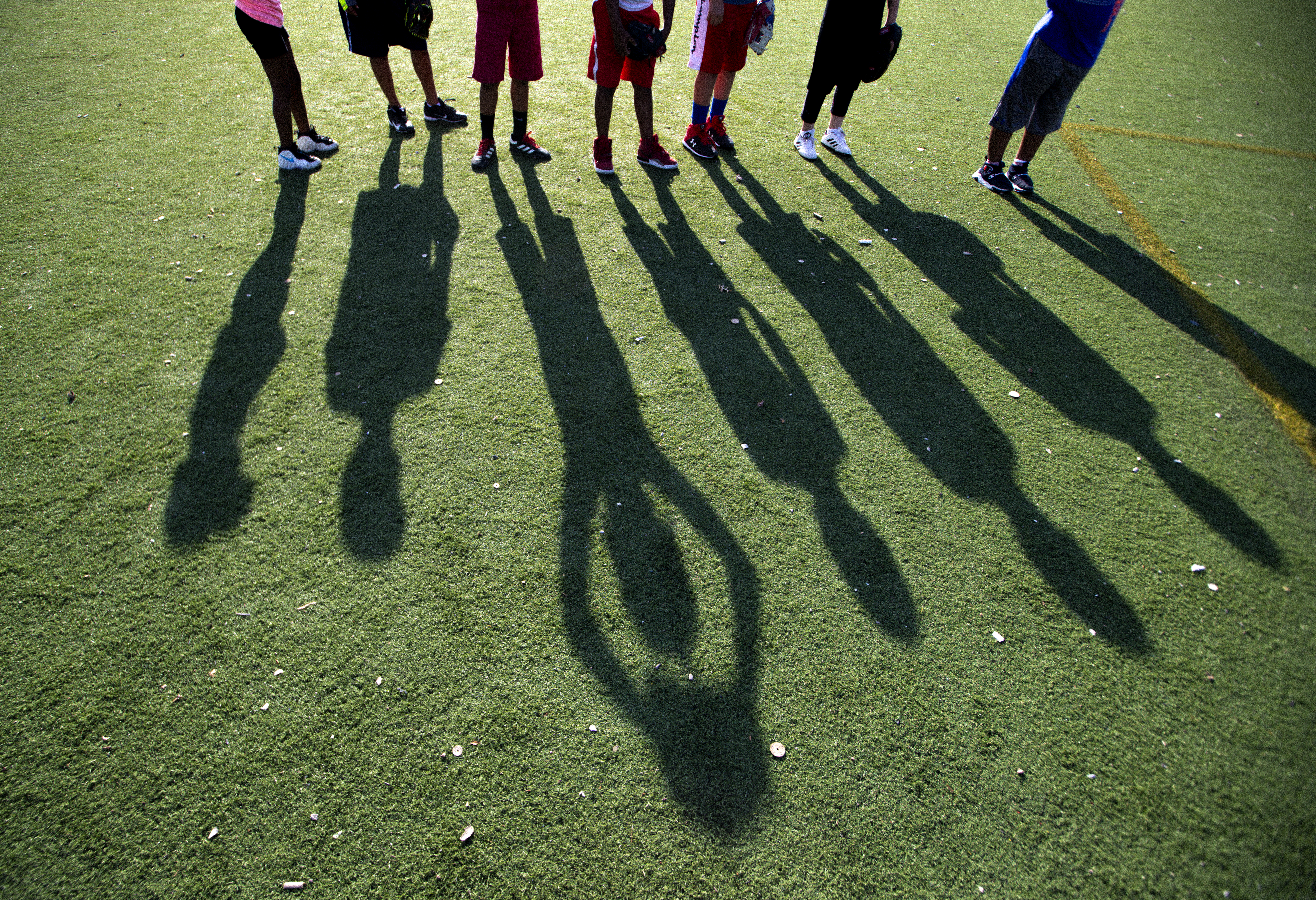 Players of the BASE Astros lined up during drills at Madison Park High School.