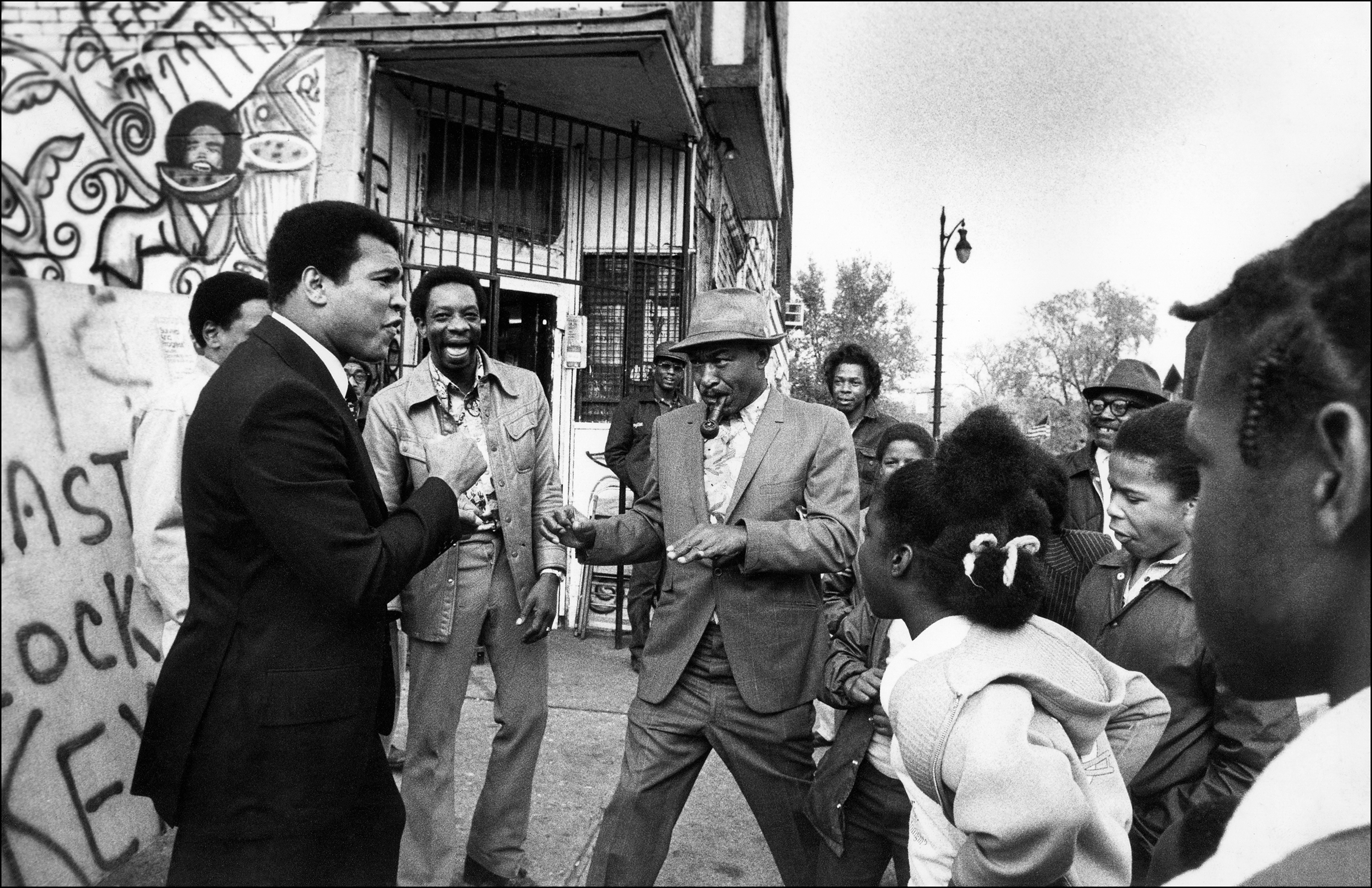 Muhammad Ali enjoying a spontaneous encounter with his fans in Detroit, circa 1977, from "Muhammad Ali."