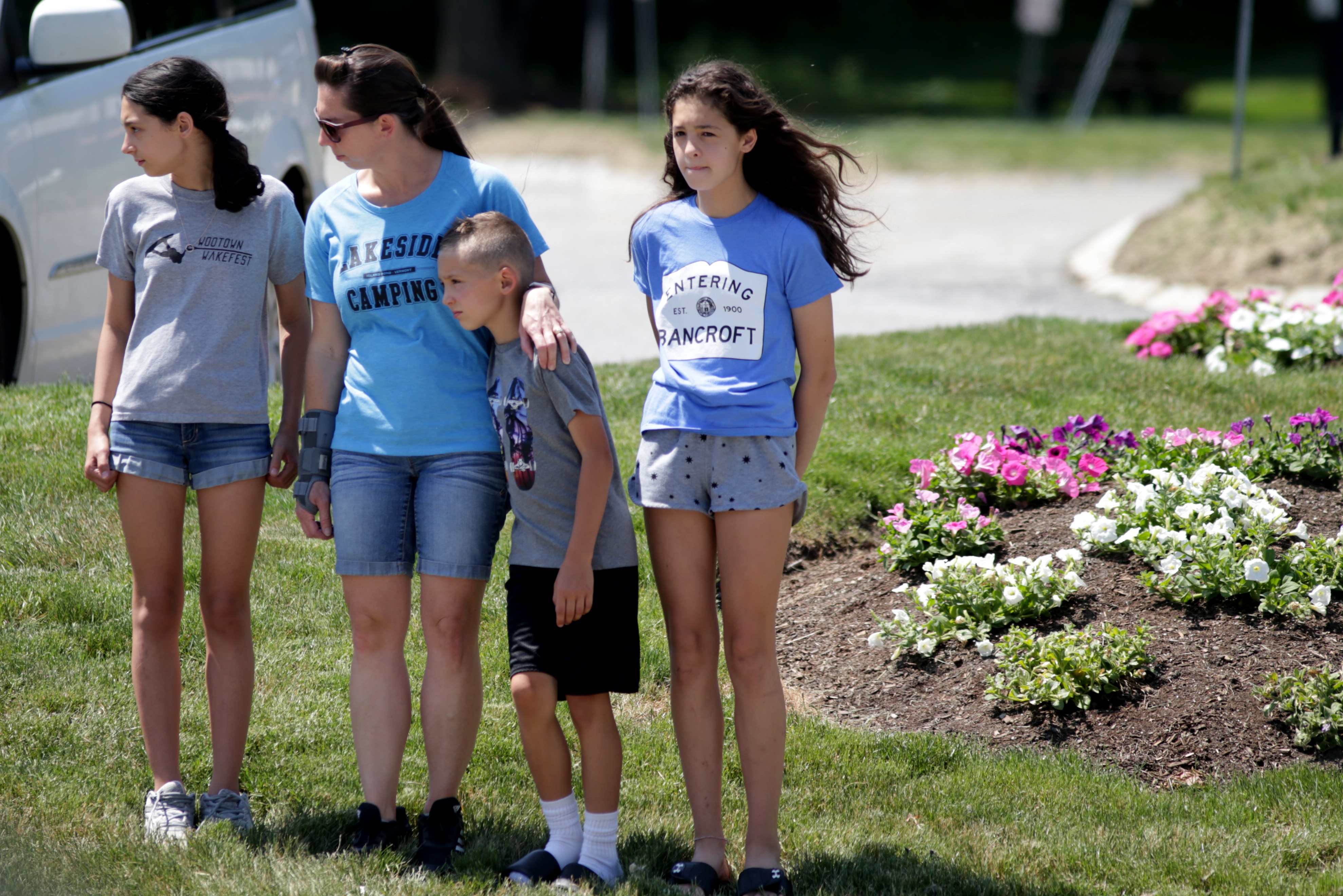 People paid their respects outside of the Mercadante funeral home before the body of Worcester officer Enmanuel Familia arrived Saturday.