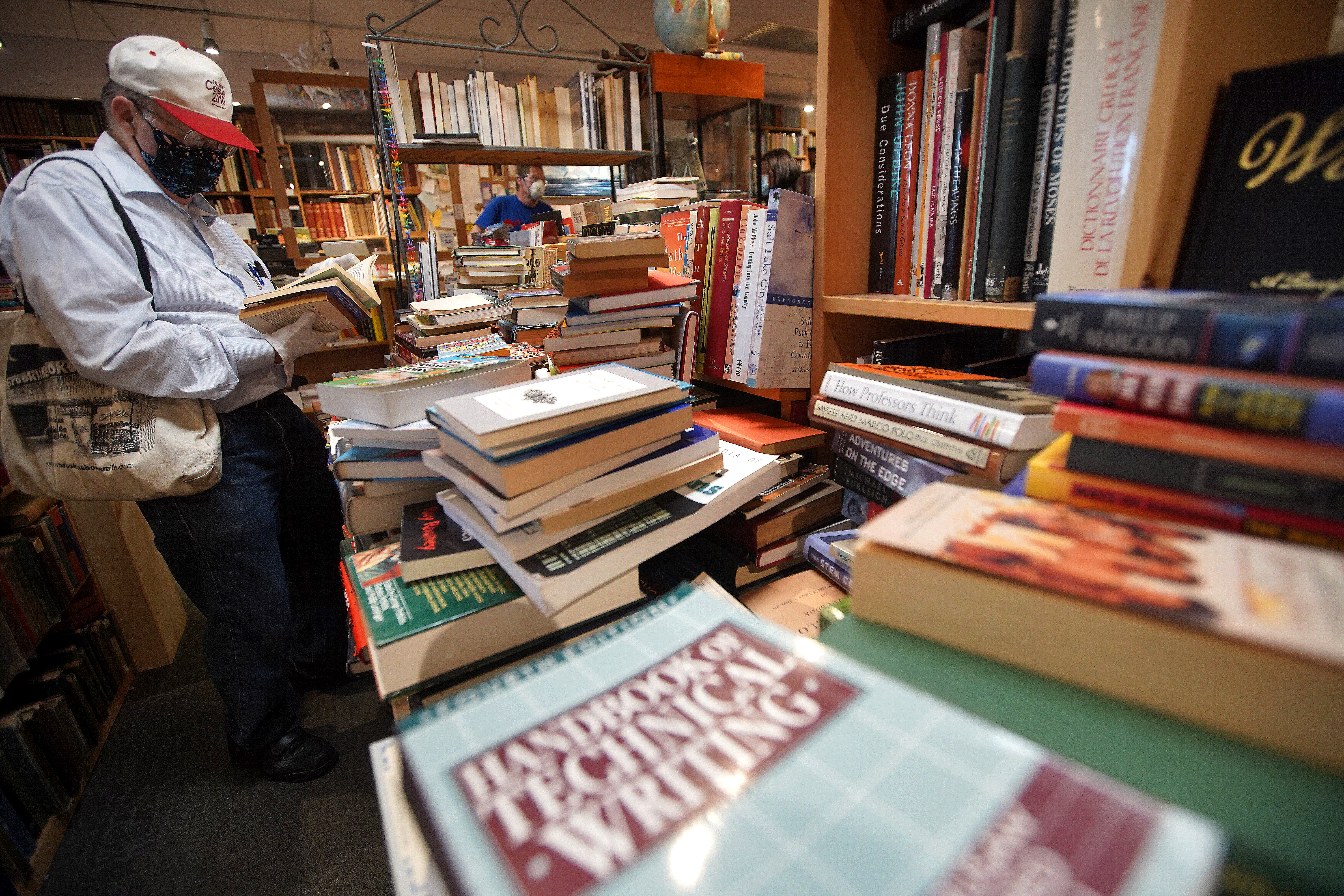 Customers browse at Rodney's Book Store, which has been in the square for 20 years, and is leaving
