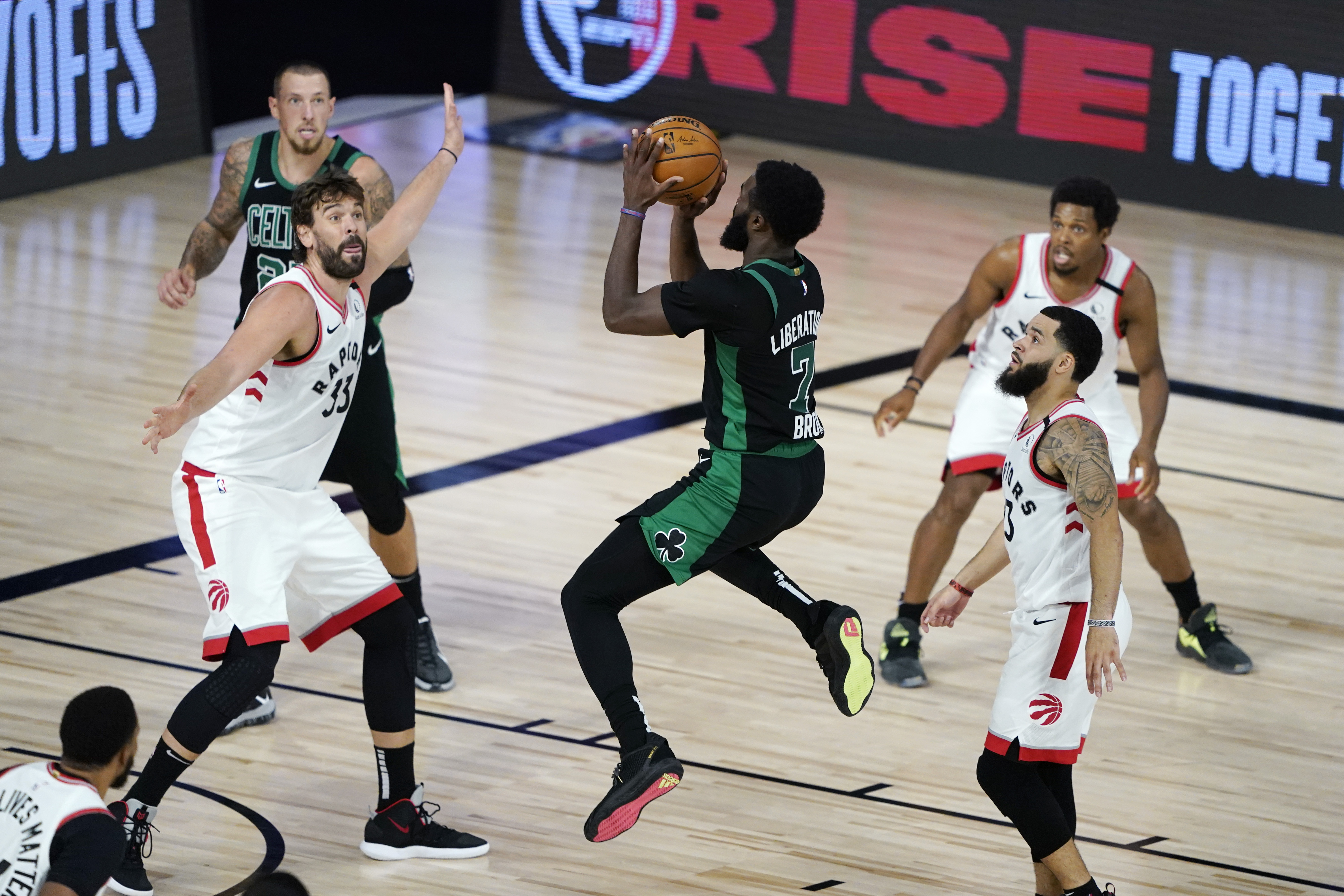 Jaylen Brown shoots against Toronto's Marc Gasol in the first half of Sunday's game.