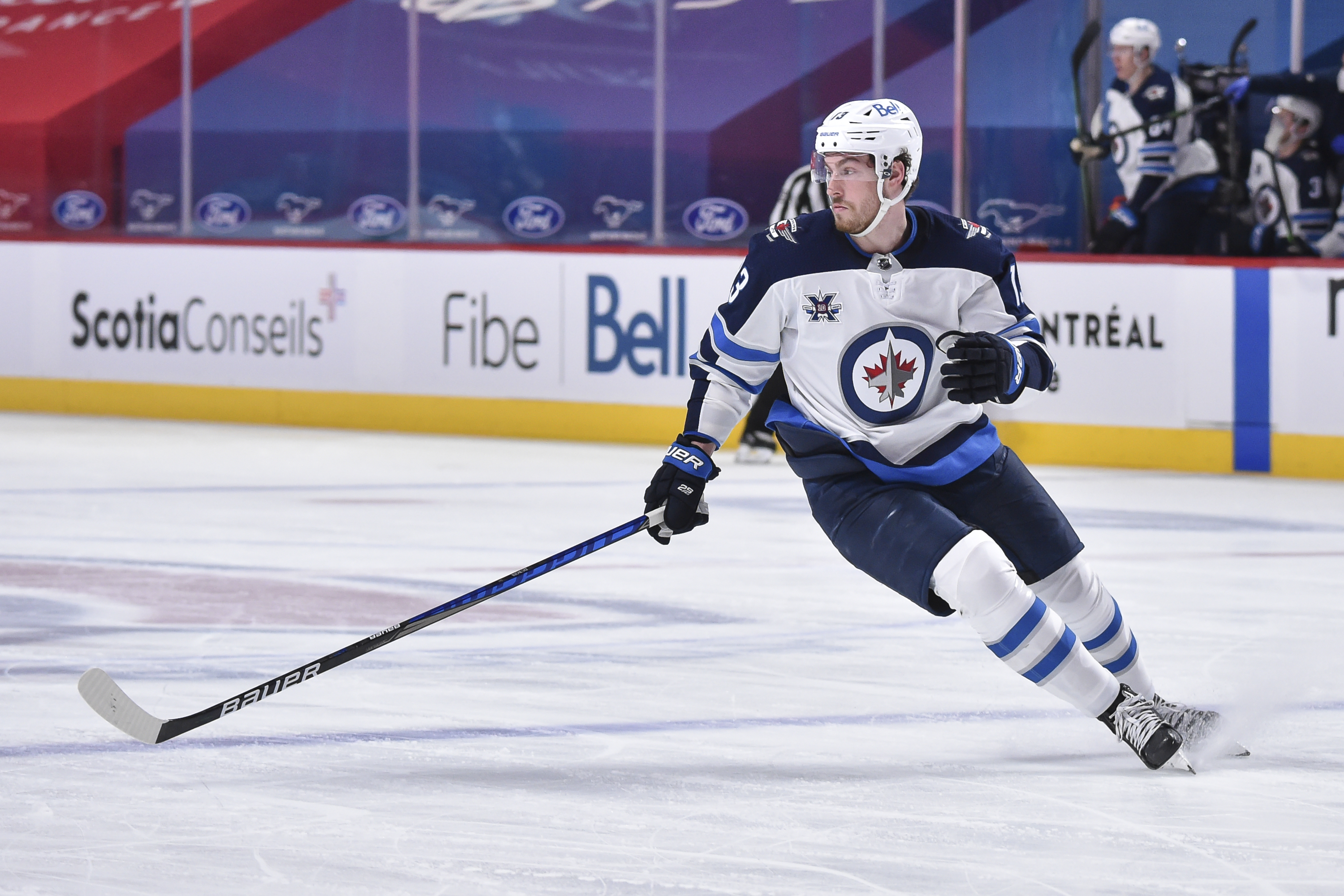 Winnipeg's Pierre-Luc Dubois changed his number from 13 to 80 to honor former teammate Matiss Kivlenieks.
