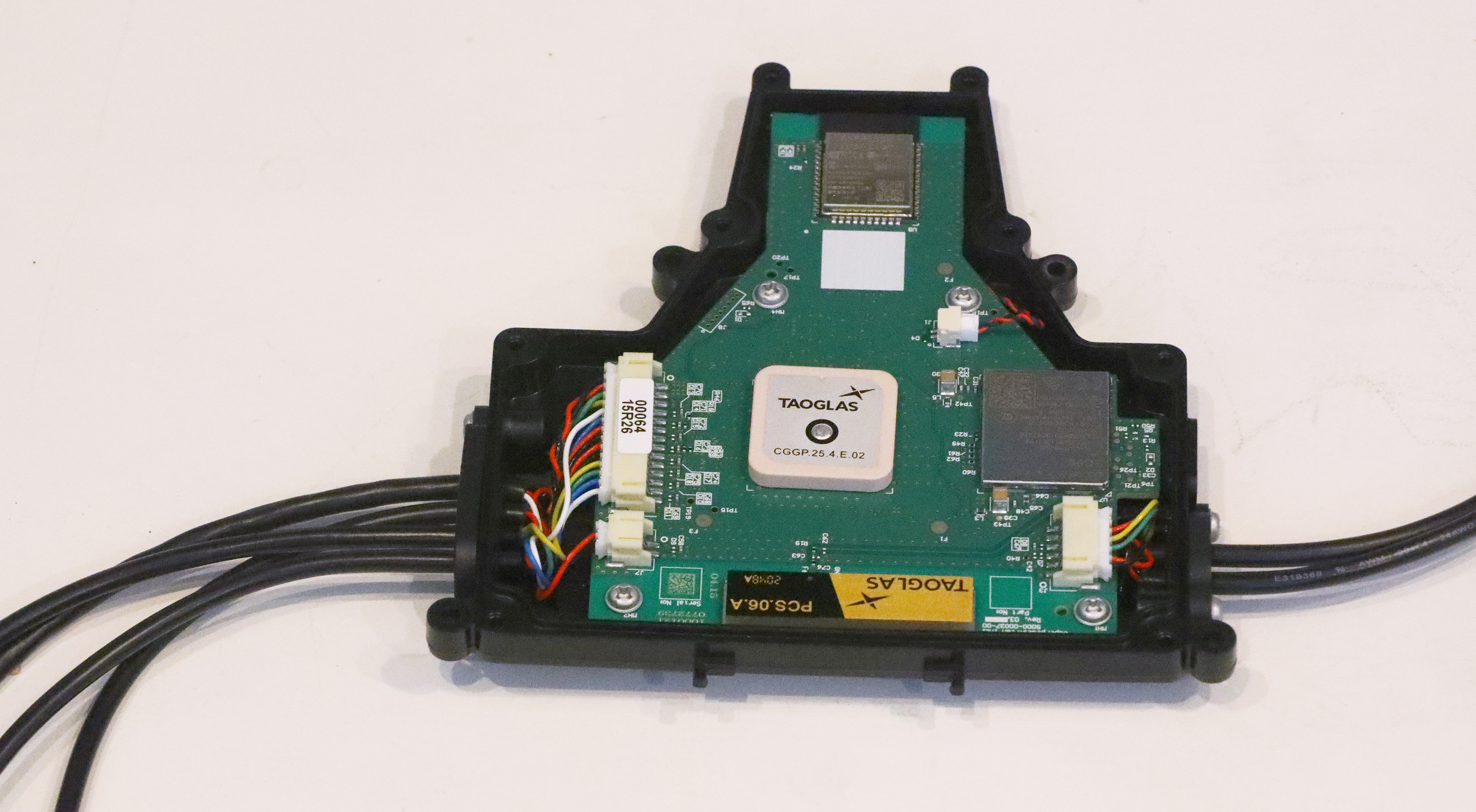A system controller with a printed circuit board in the electrical engineering lab of Superpedestrian.