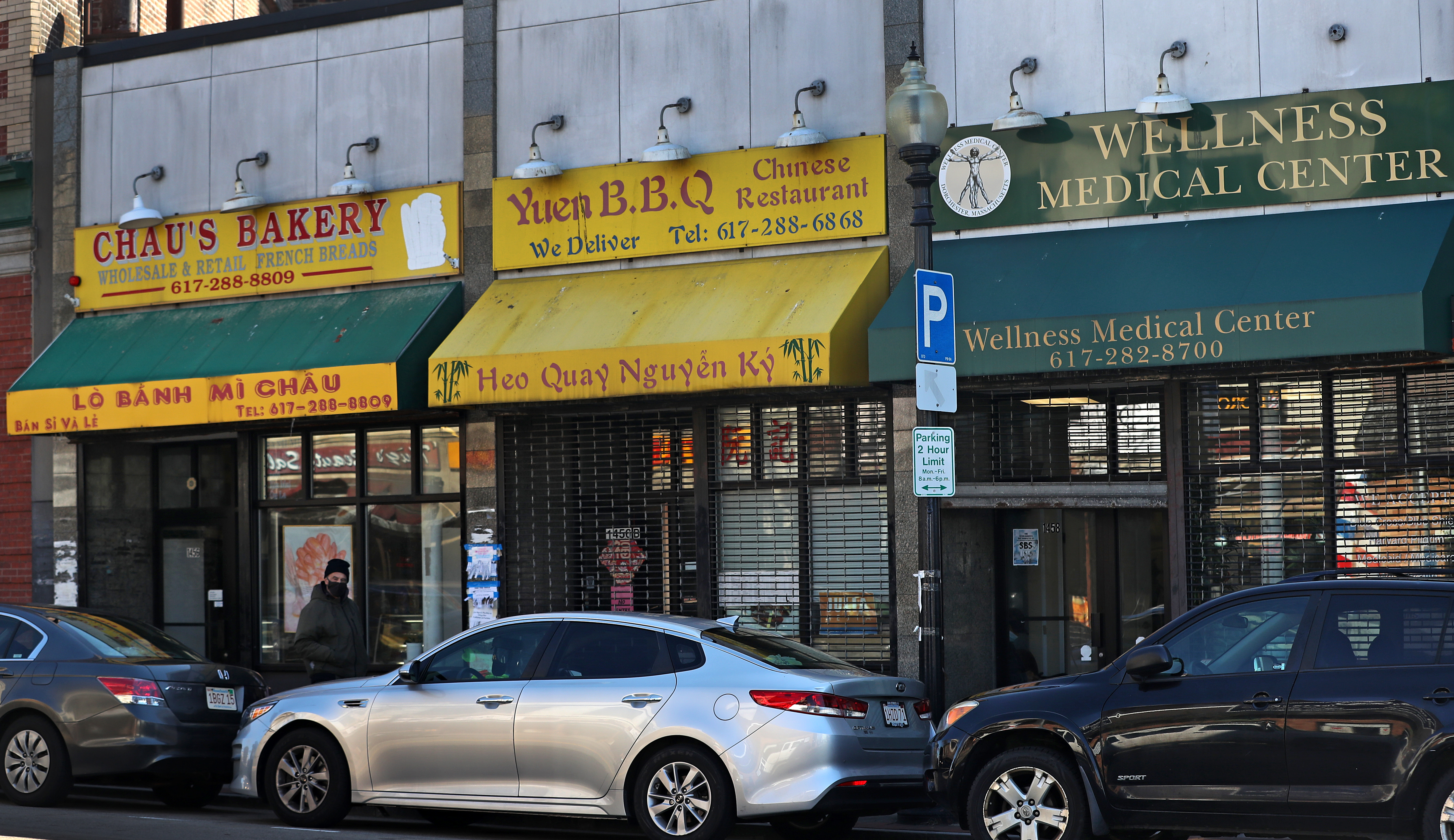 A bakery, restaurant, and medical center are lined up on Dorchester Avenue.