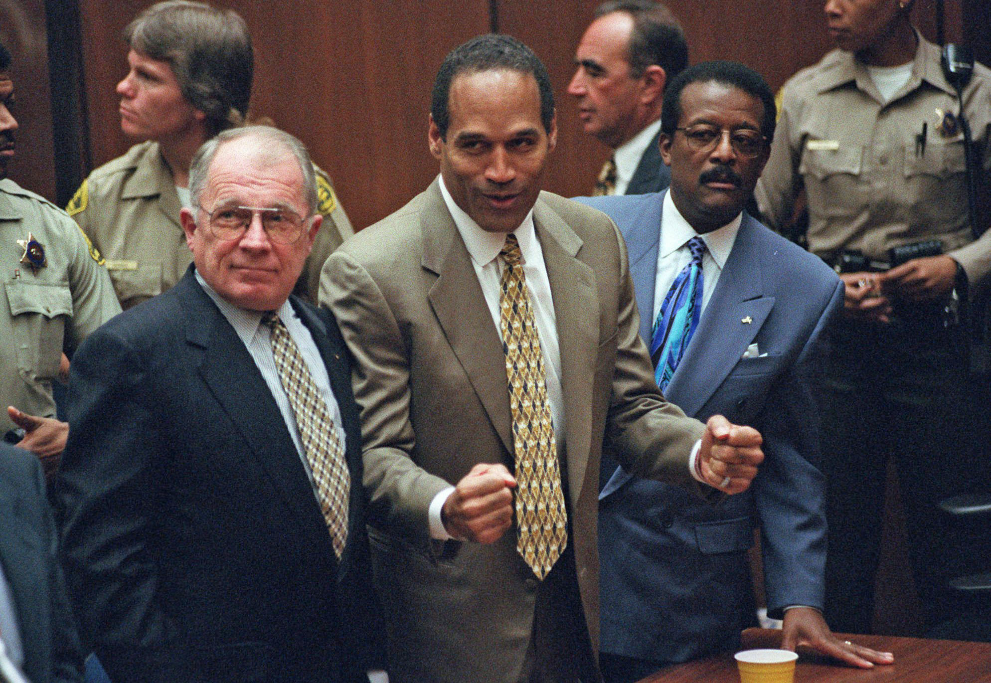 Mr. Bailey (left), with O.J. Simpson as the defendant learned he had been found not guilty of murdering his ex-wife, Nicole Brown, and her friend Ron Goldman.
