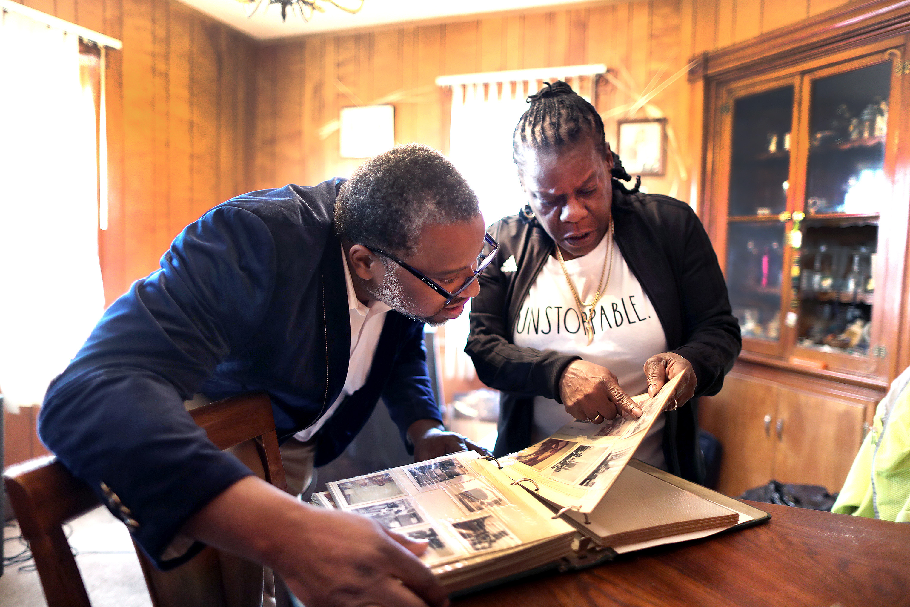 The two looked at family photo albums. They have discovered that their paths almost crossed many times through the years.