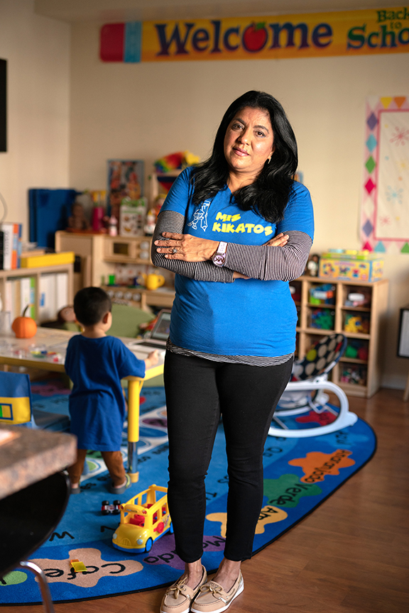 Maritza Manrique, an immigrant from Colombia, runs a small child-care program in her East Boston home.